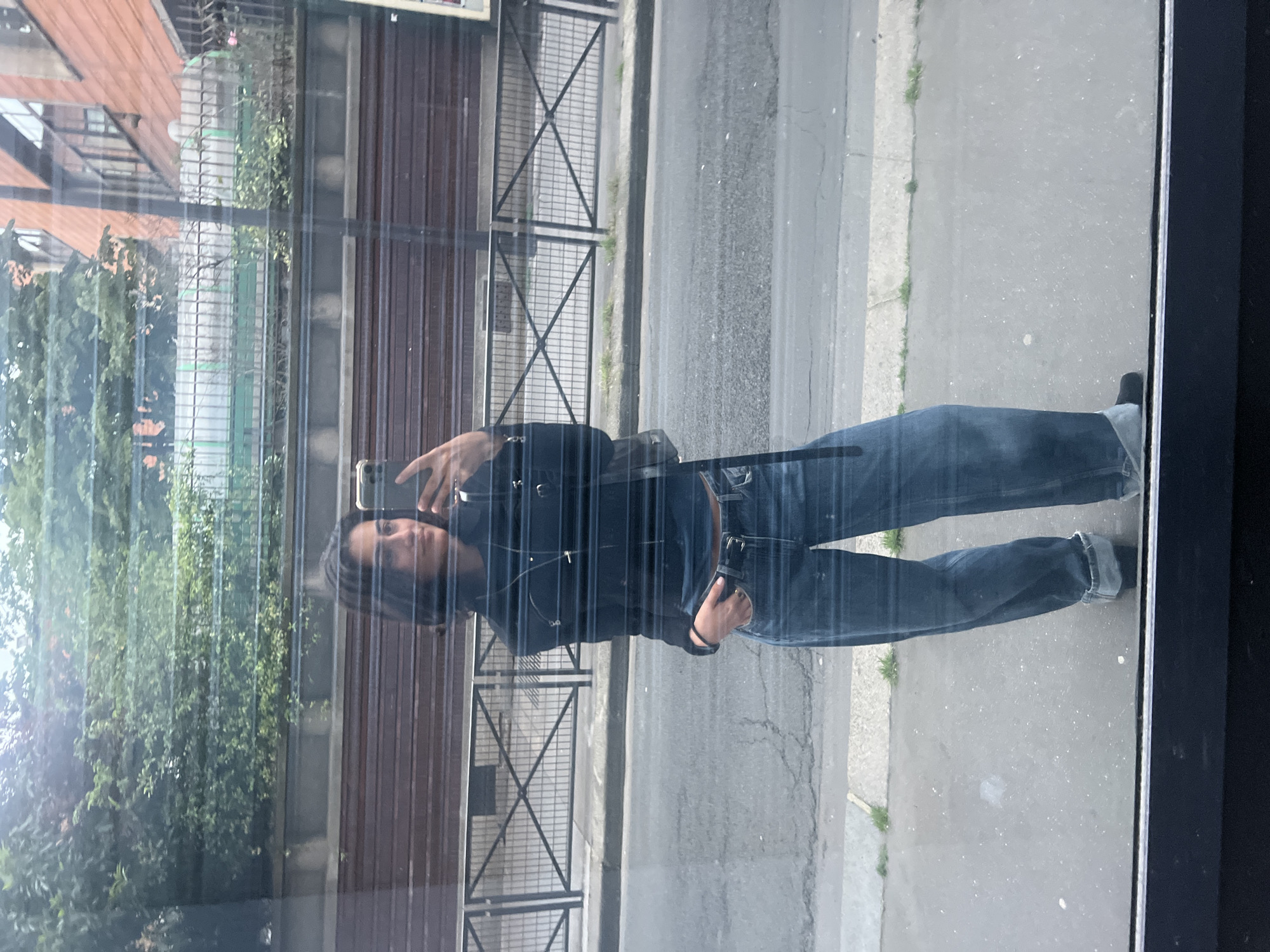 Person takes selfie on Paris street