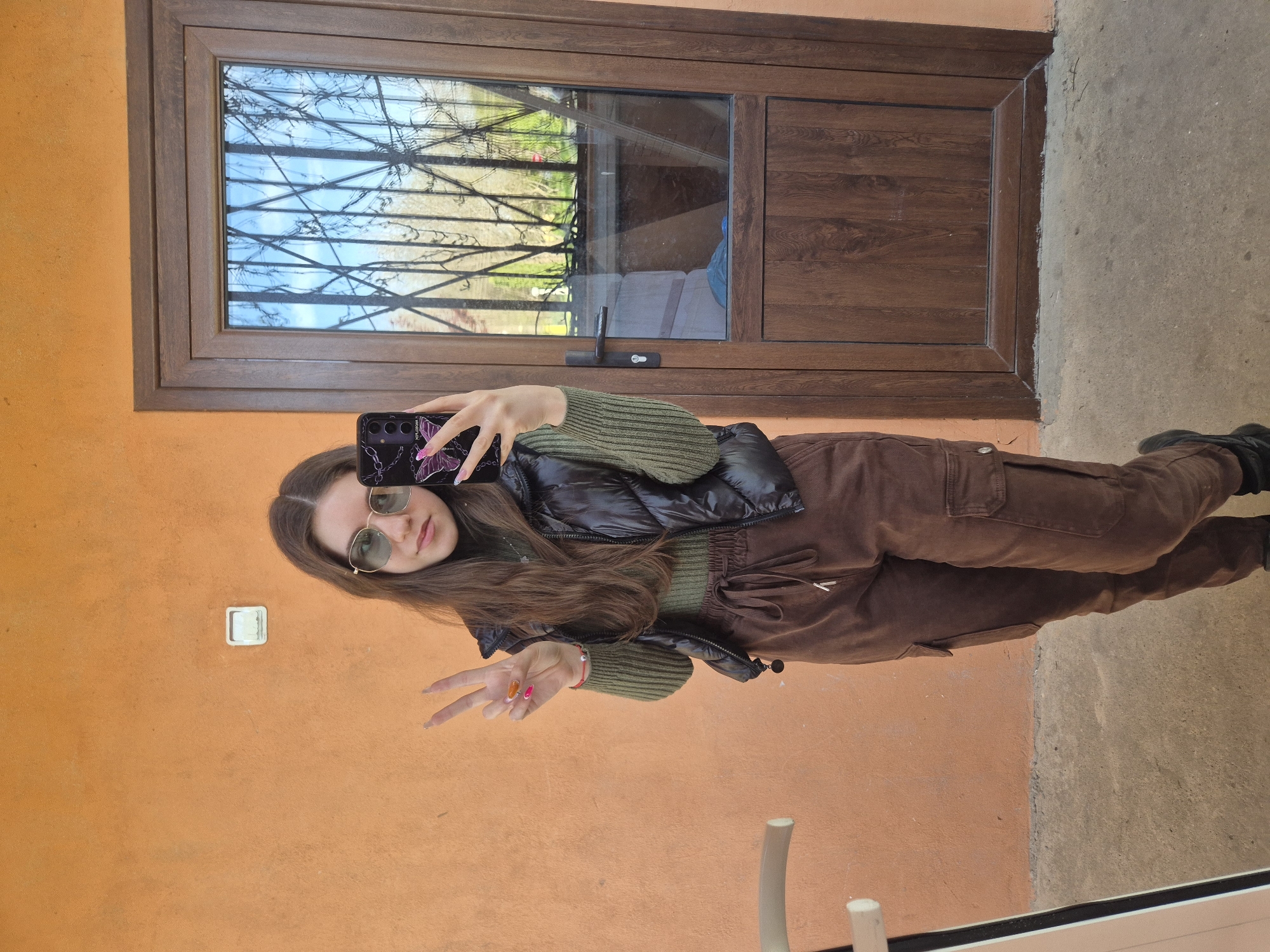 Woman takes selfie outdoors in Pavlikeni, Bulgaria
