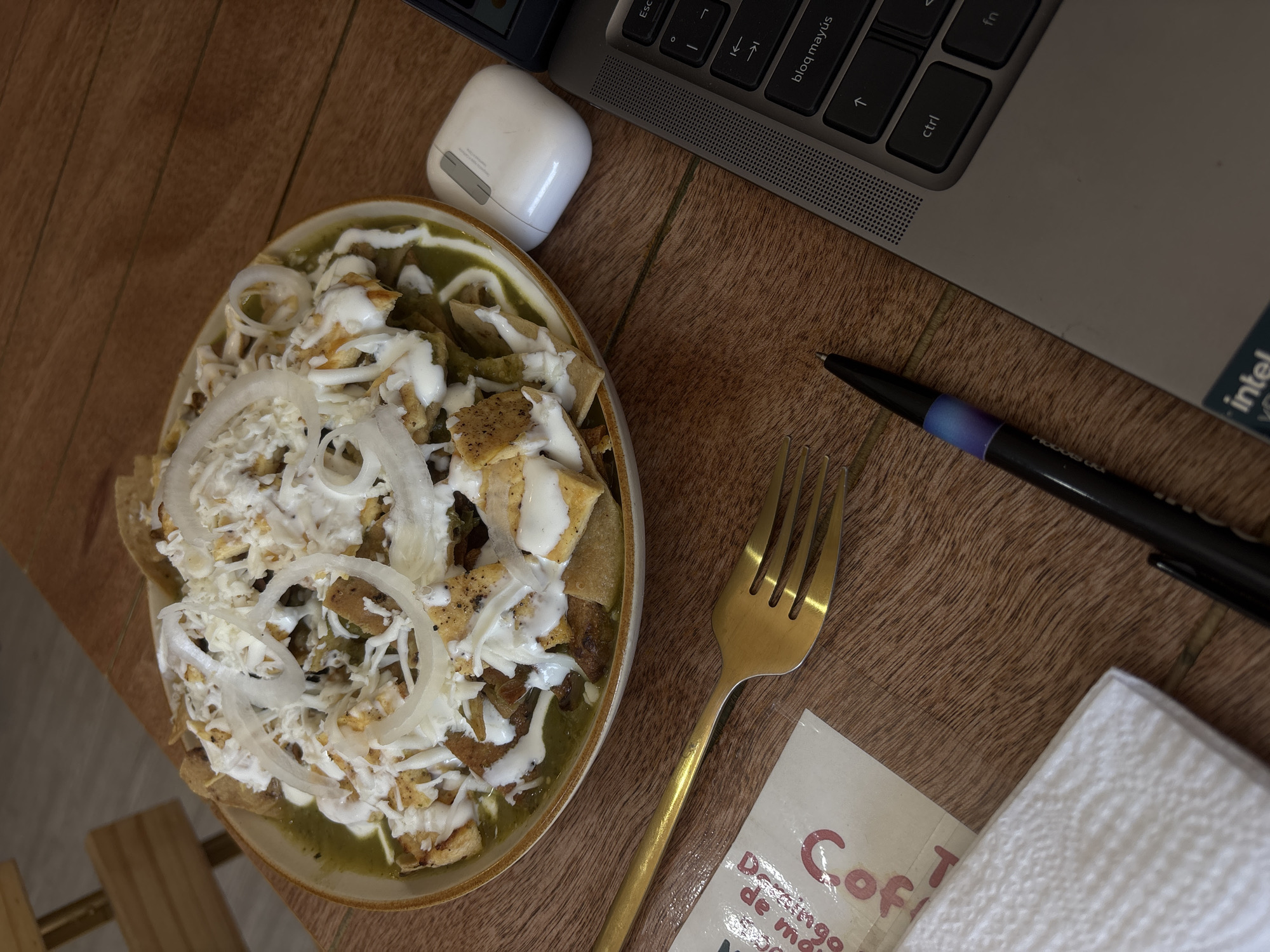 Chilaquiles meal photographed from above at table setting