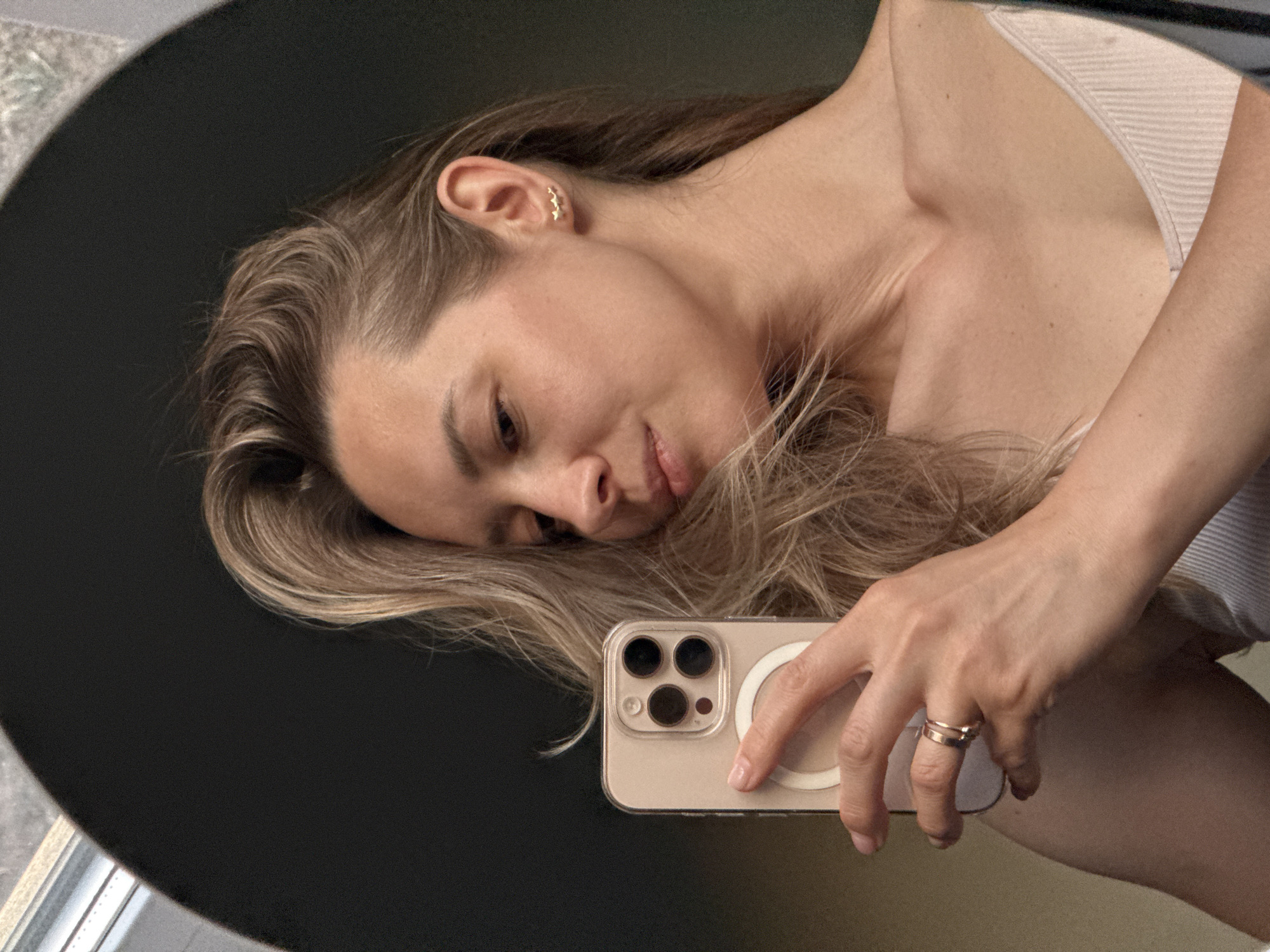 Woman documents evening moments through selfies in Chaikovsky, Russia