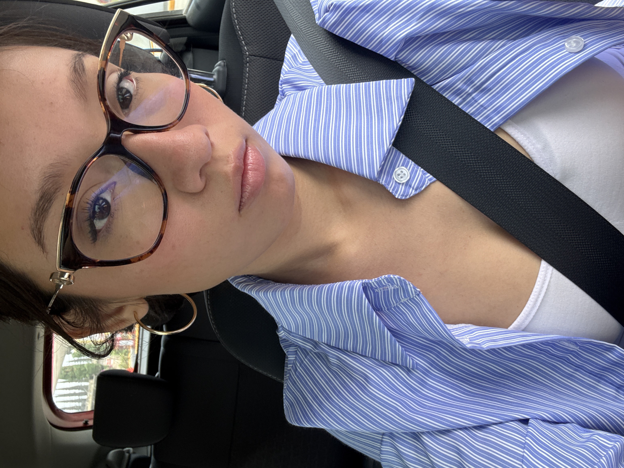 Woman in striped shirt observed in vehicle in Puebla
