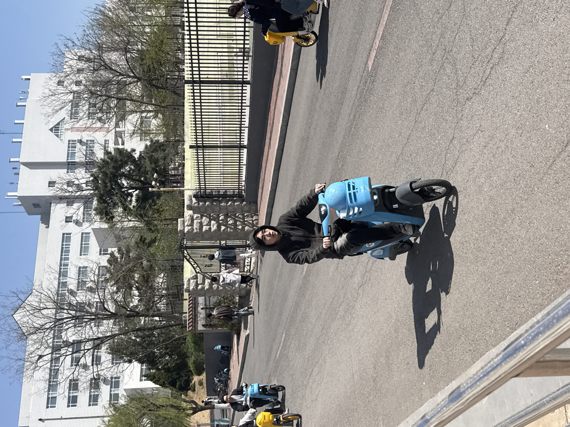 Early morning scooter riders spotted in Zhongtun, China