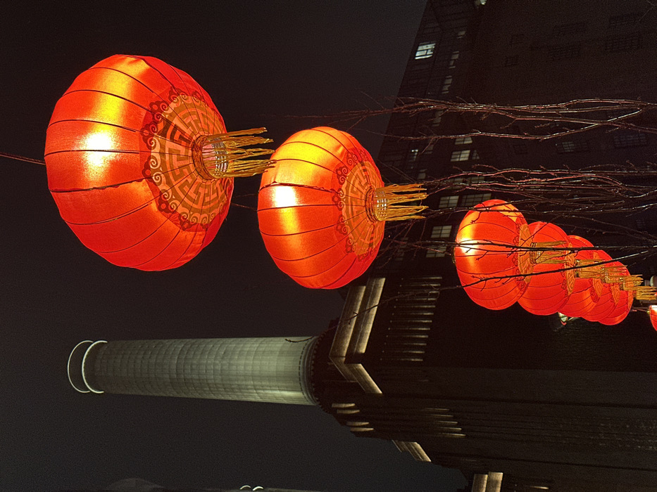 Red Chinese lanterns illuminate London night sky display