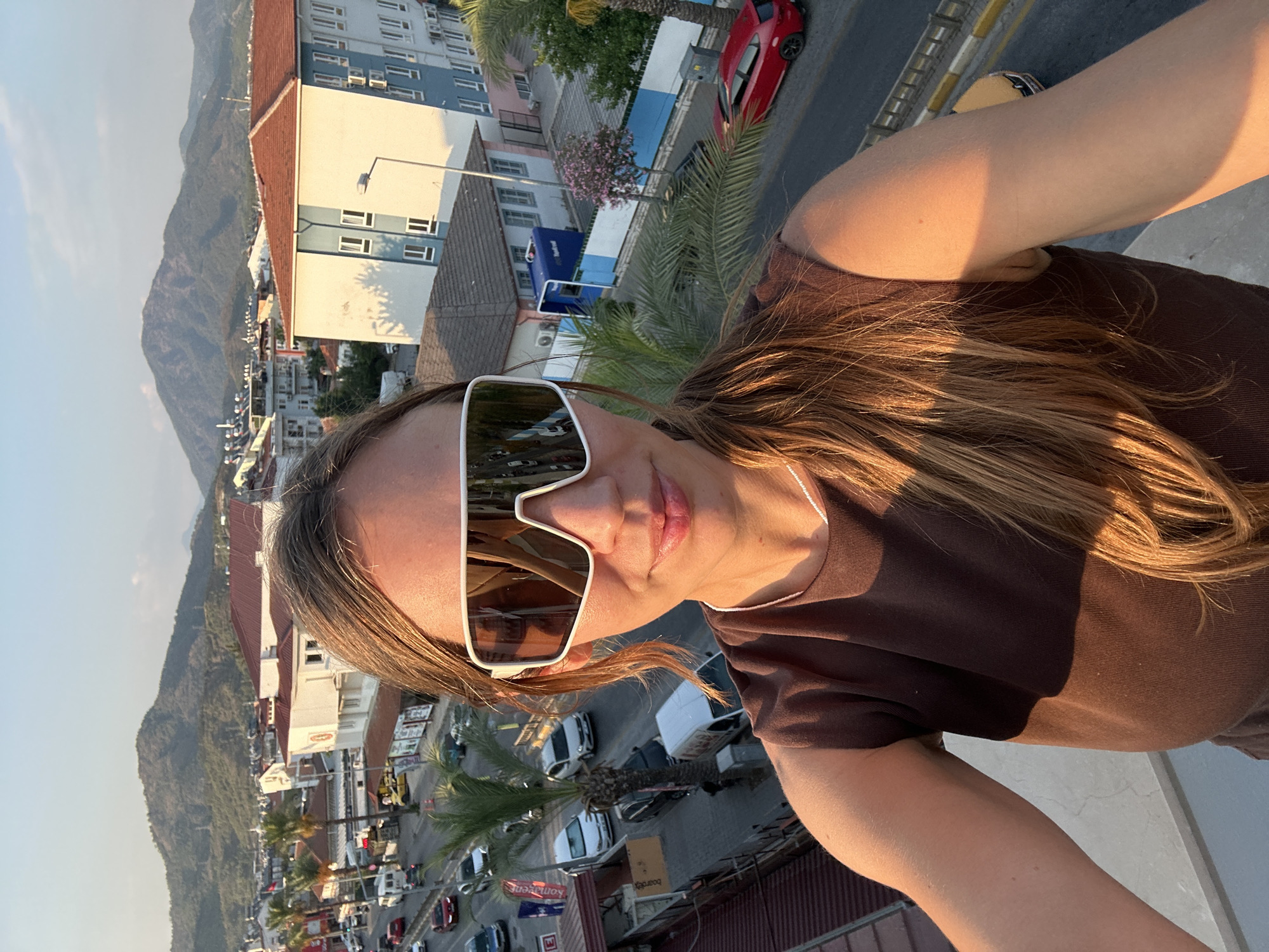 Glowing figurines on a Fethiye rooftop at sunset