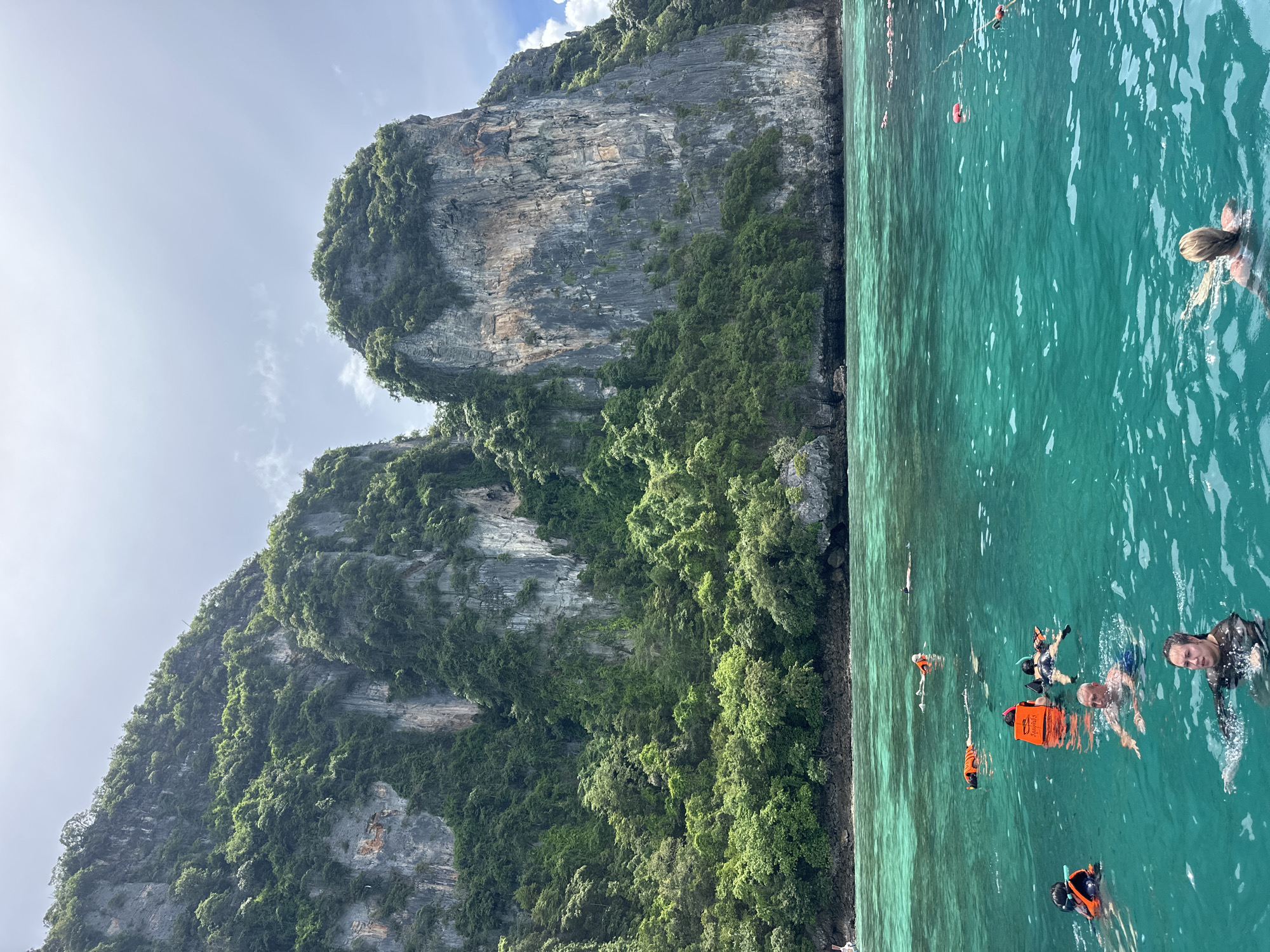 Snorkeling and boats at Ao Nang's limestone cliffs