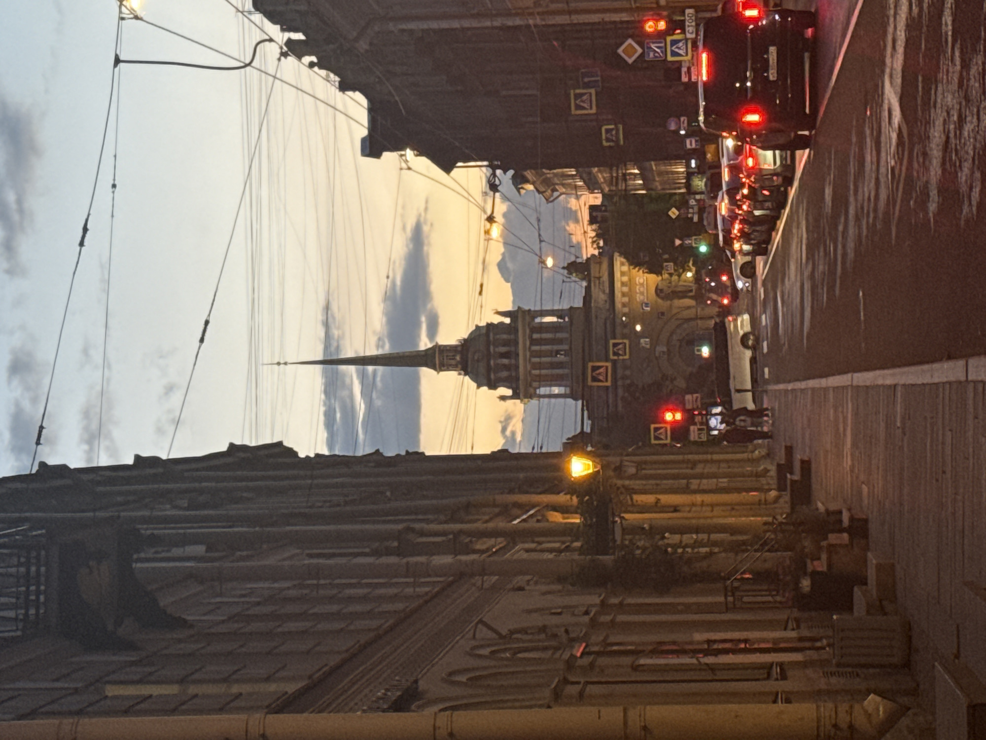 Tourist captures Saint Petersburg landmarks during evening hours