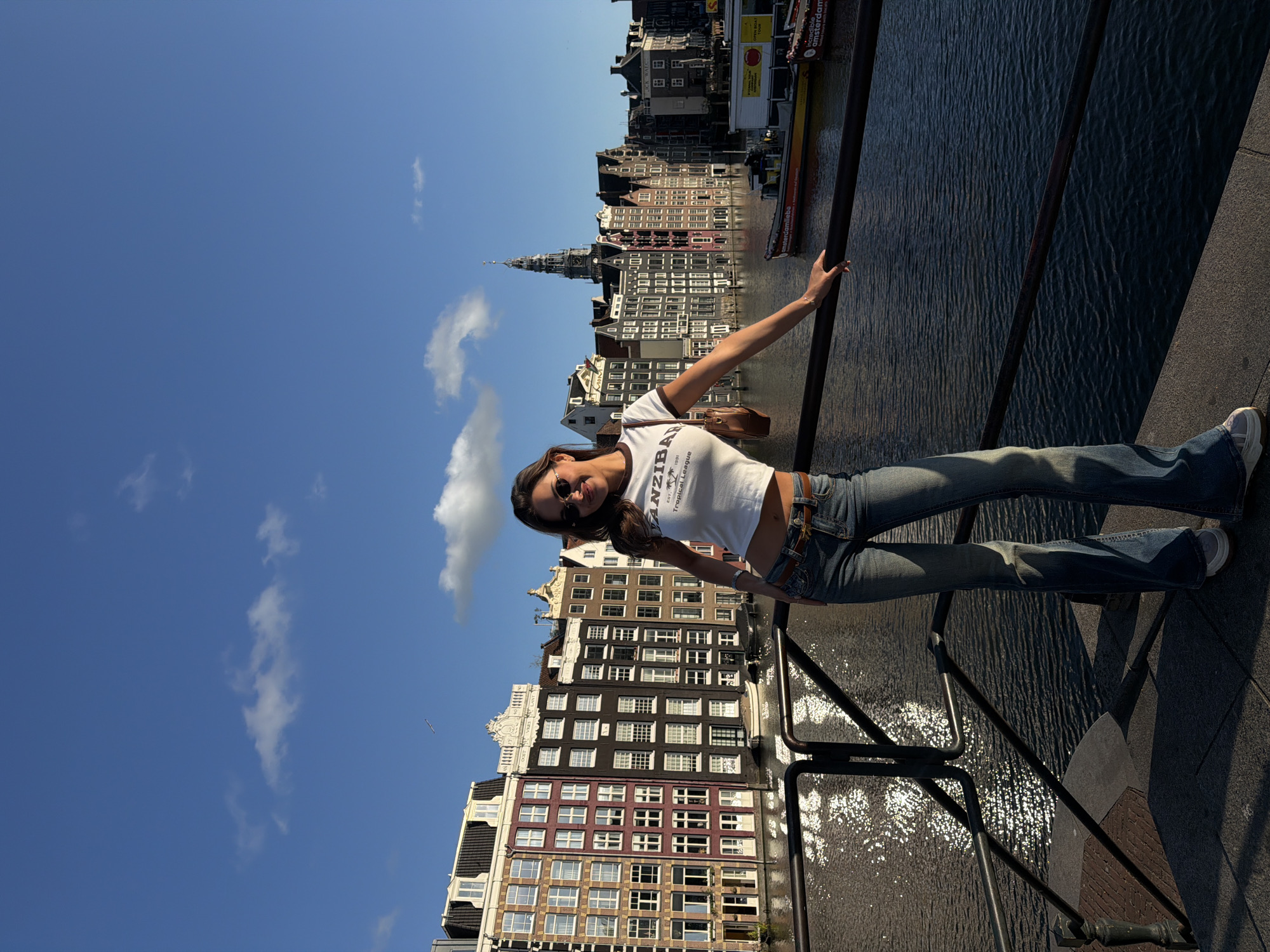 Canal bridge hangout and a neon-lit Amsterdam venue
