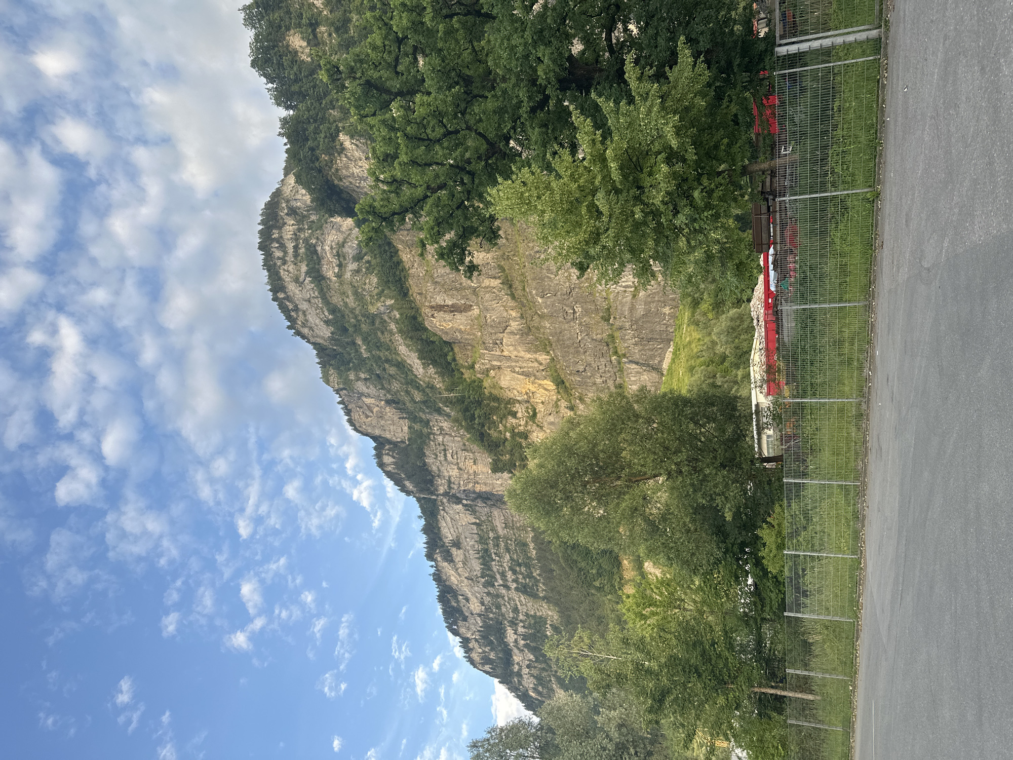 Industrial yard meets alpine scenery in Dornbirn, Austria