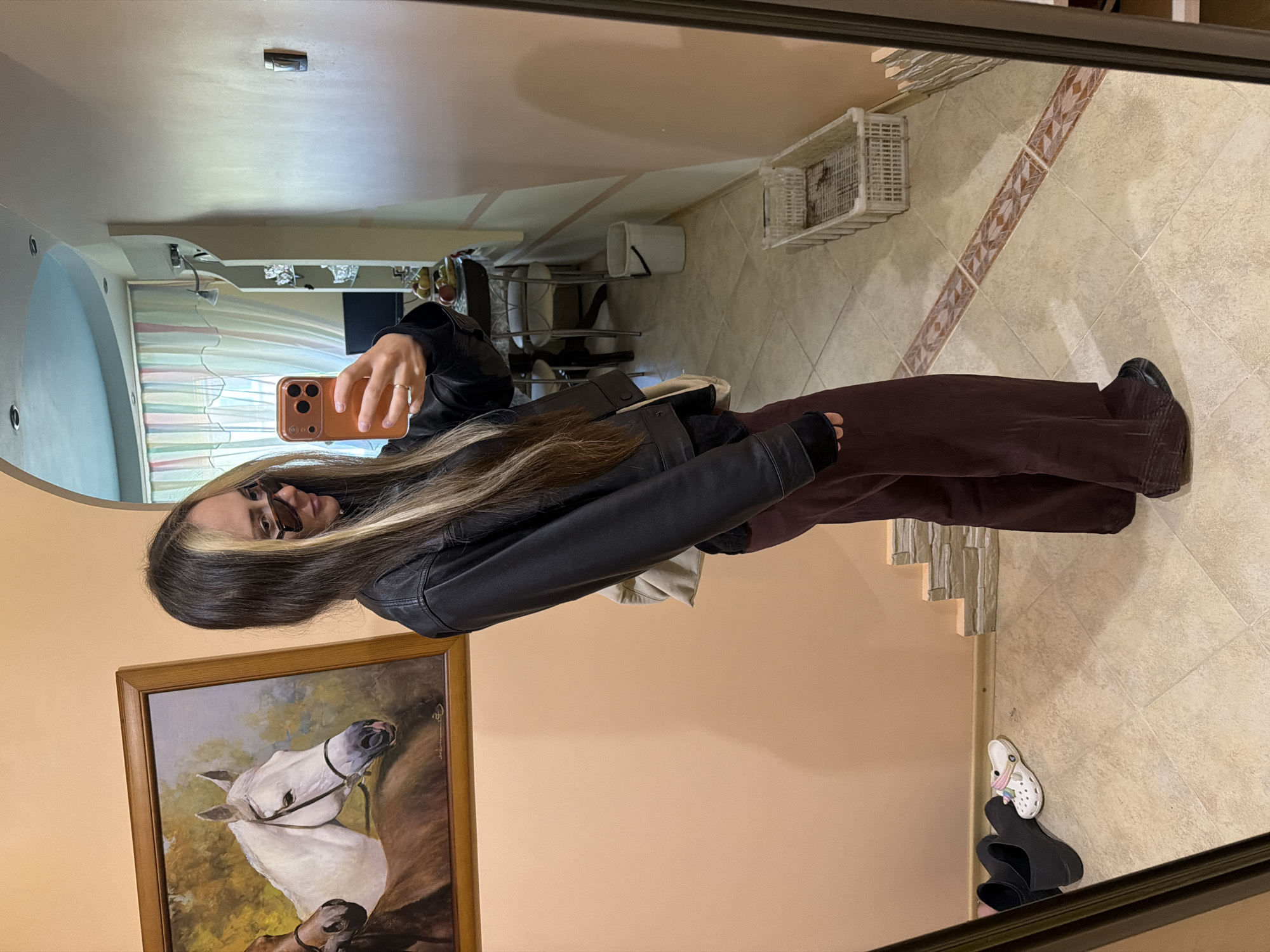 Woman and girl take mirror selfies in Kamyshin room