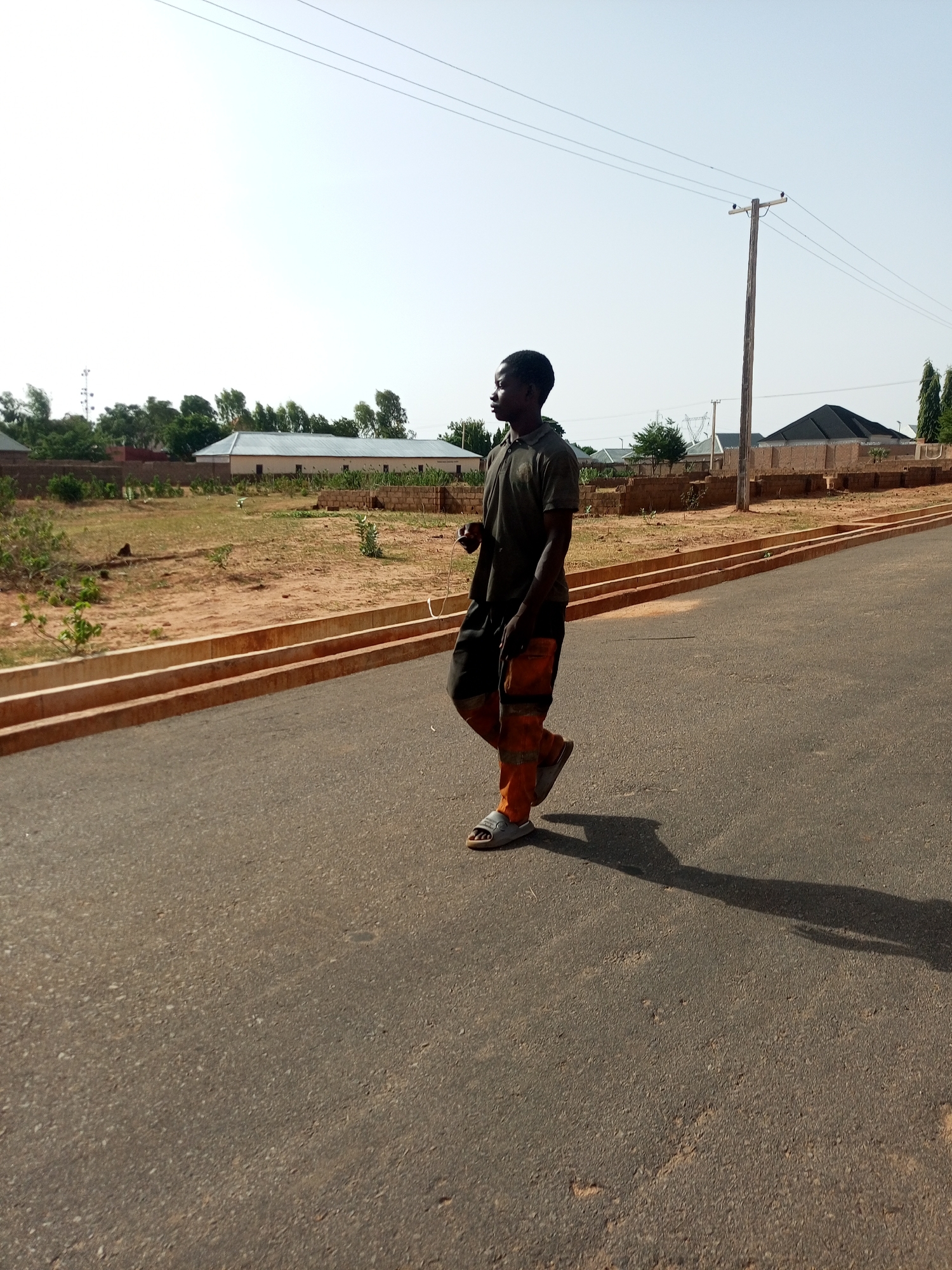 Man observed on street in Gombe, Nigeria morning hours