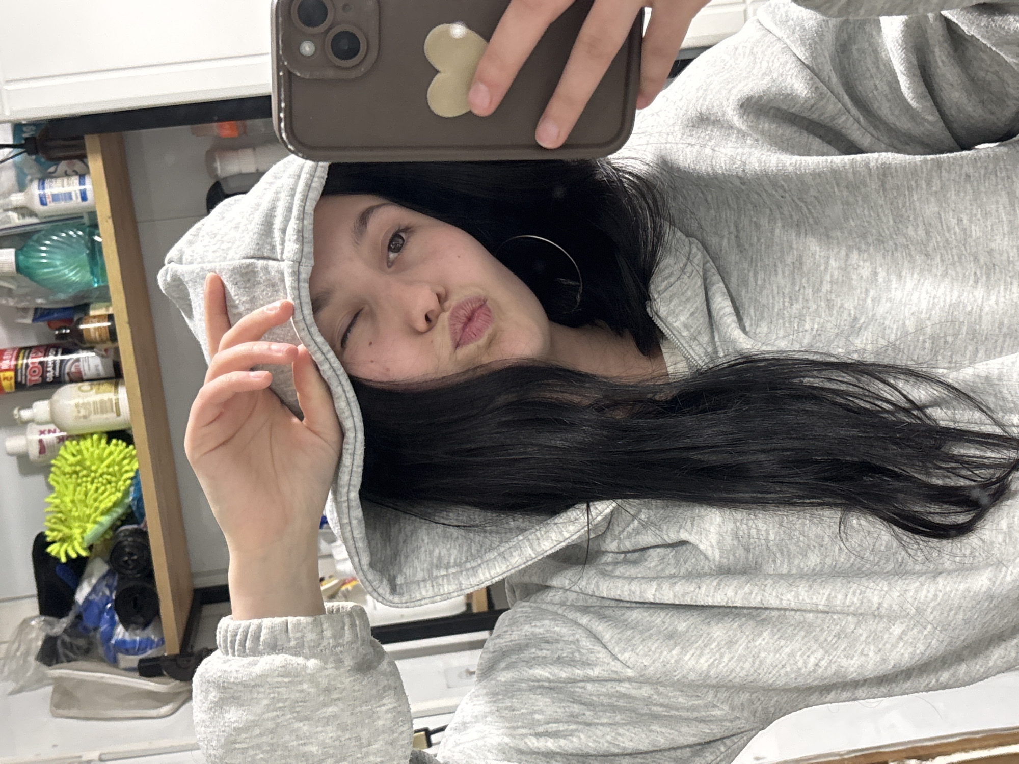 Woman documents casual afternoon with selfies and cat photos