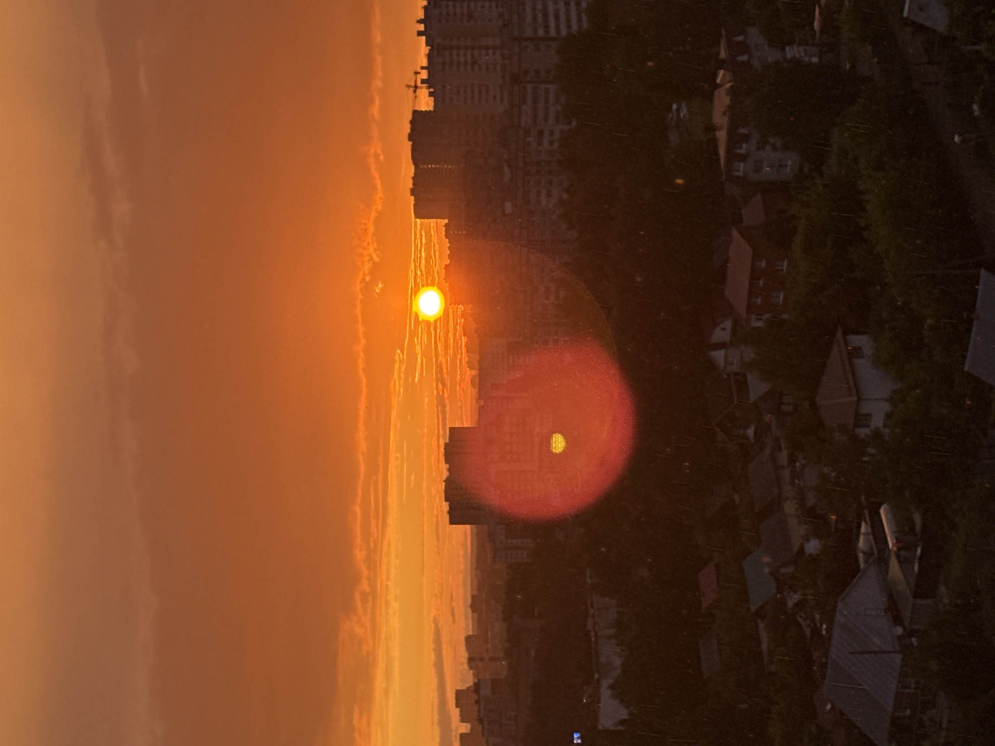 Golden hour sunset over Izhevsk, rainbow included