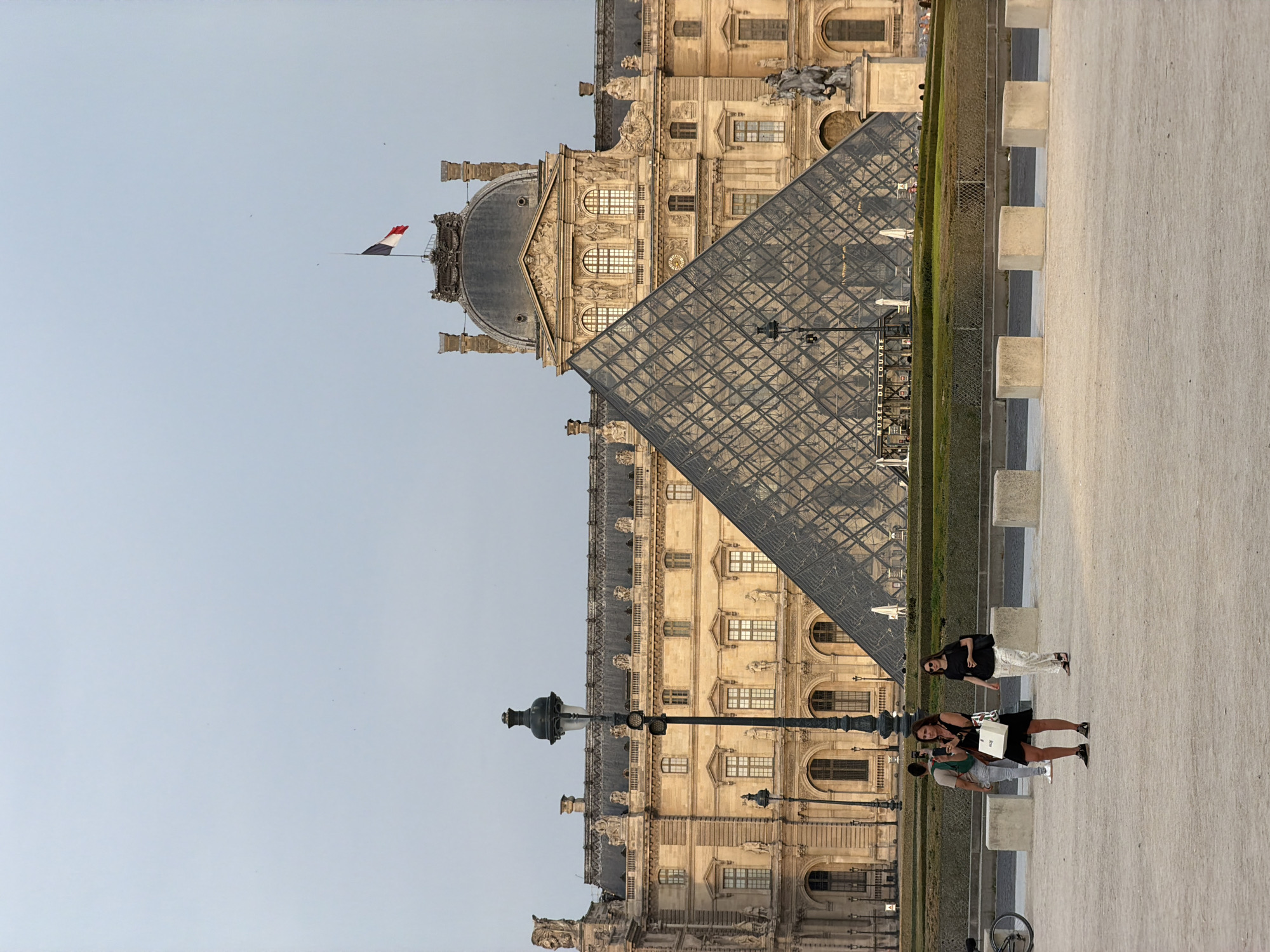 Louvre courtyard on Bastille Day evening, multiple angles