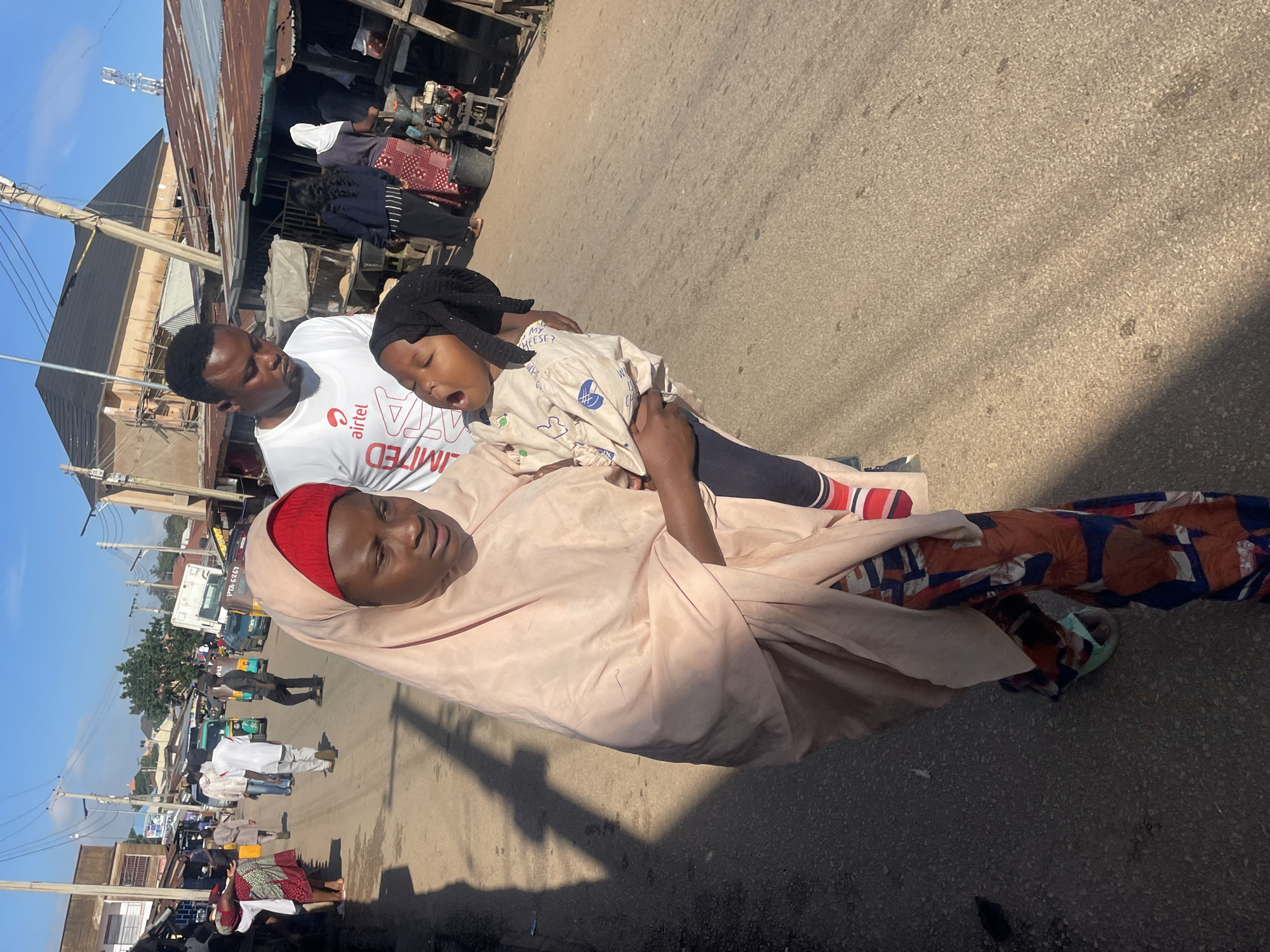 Morning street life and market activity in Jos, Nigeria
