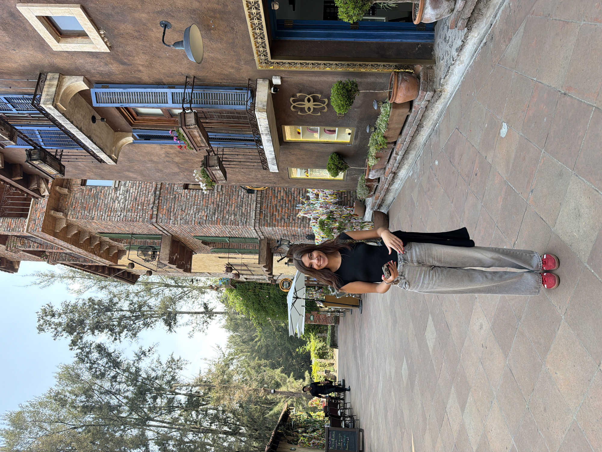 Tourist explores historic Domingo Arenas attractions during evening visit