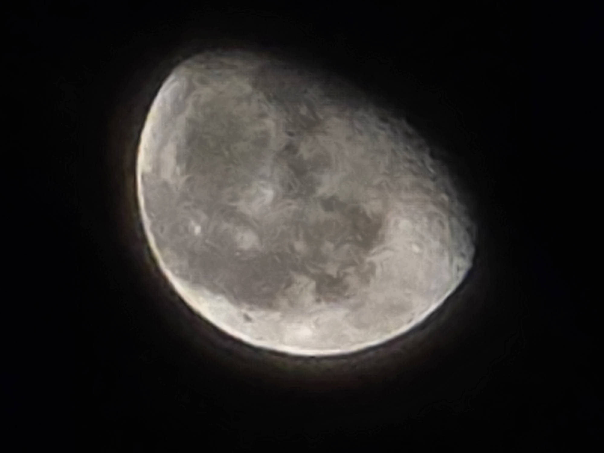Crescent moon close-up over Naberezhnye Chelny night sky