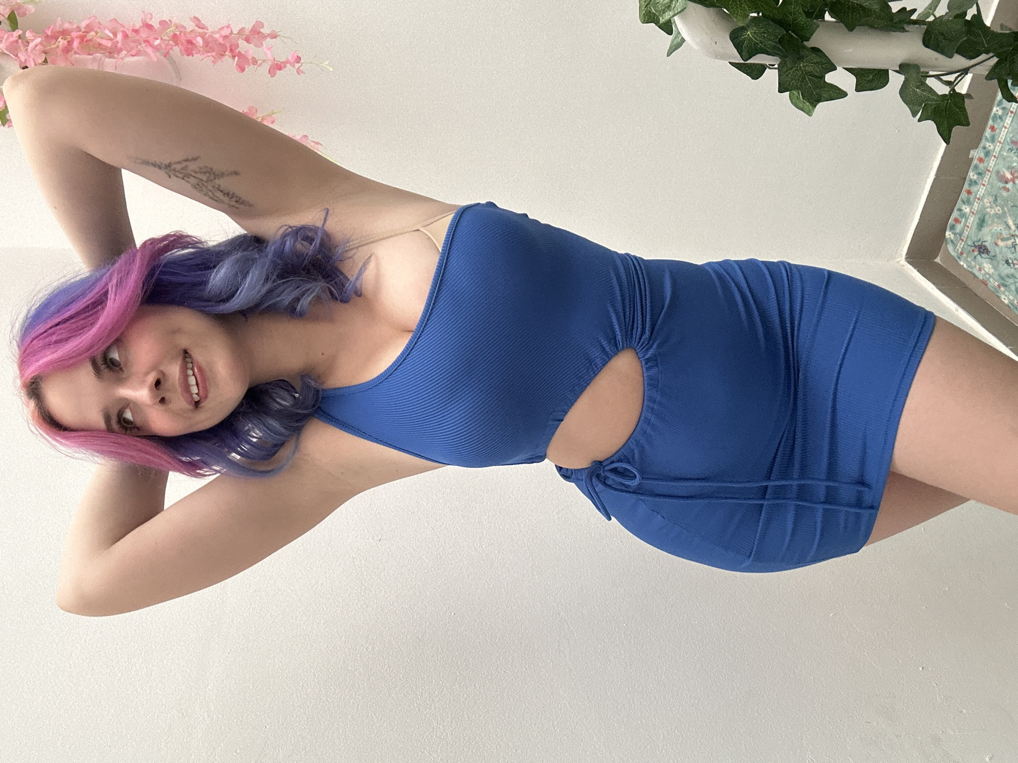 Woman takes colorful hair mirror selfie session in Zagreb