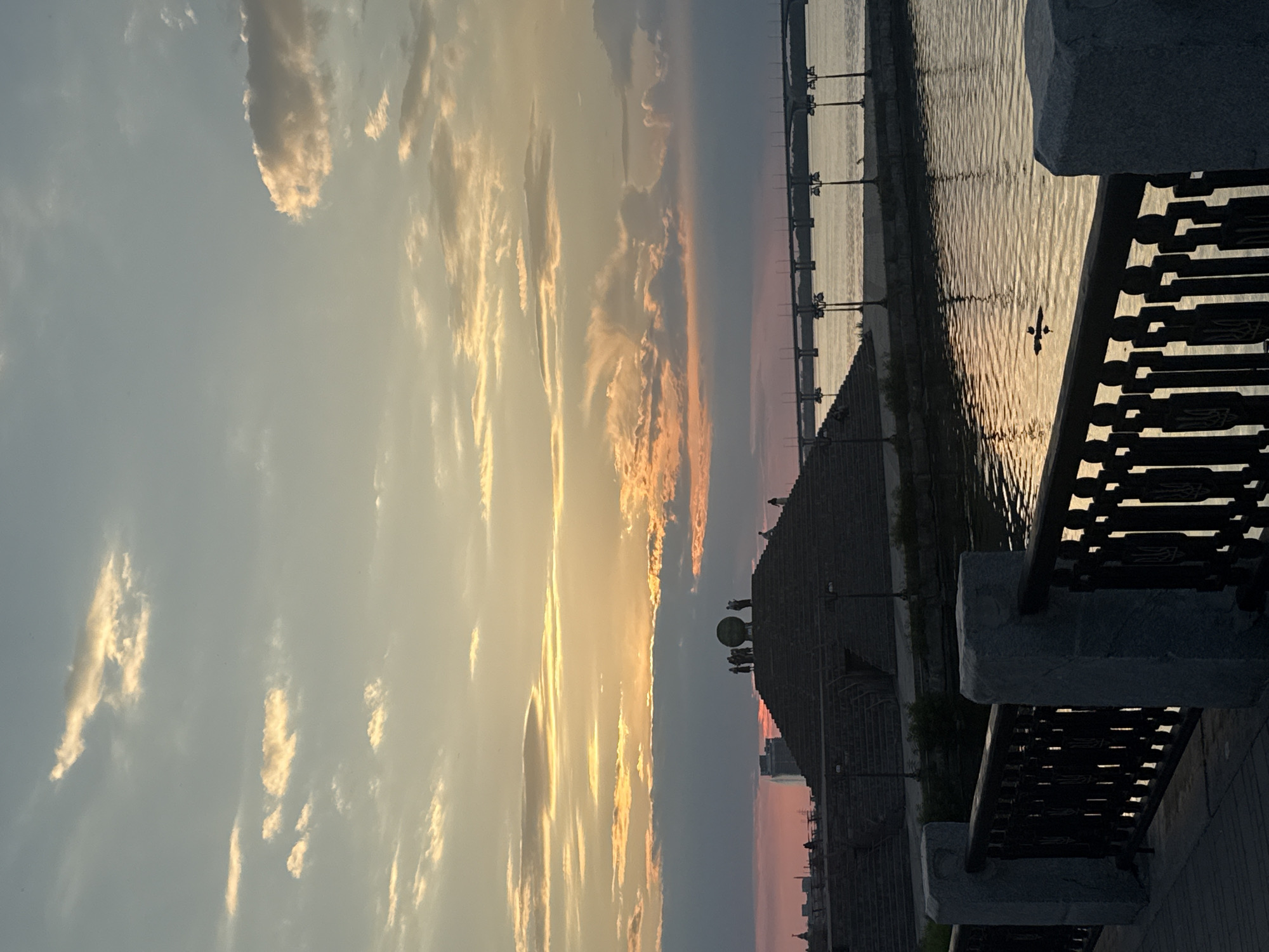 Golden hour colors over the Dnipro River at sunset