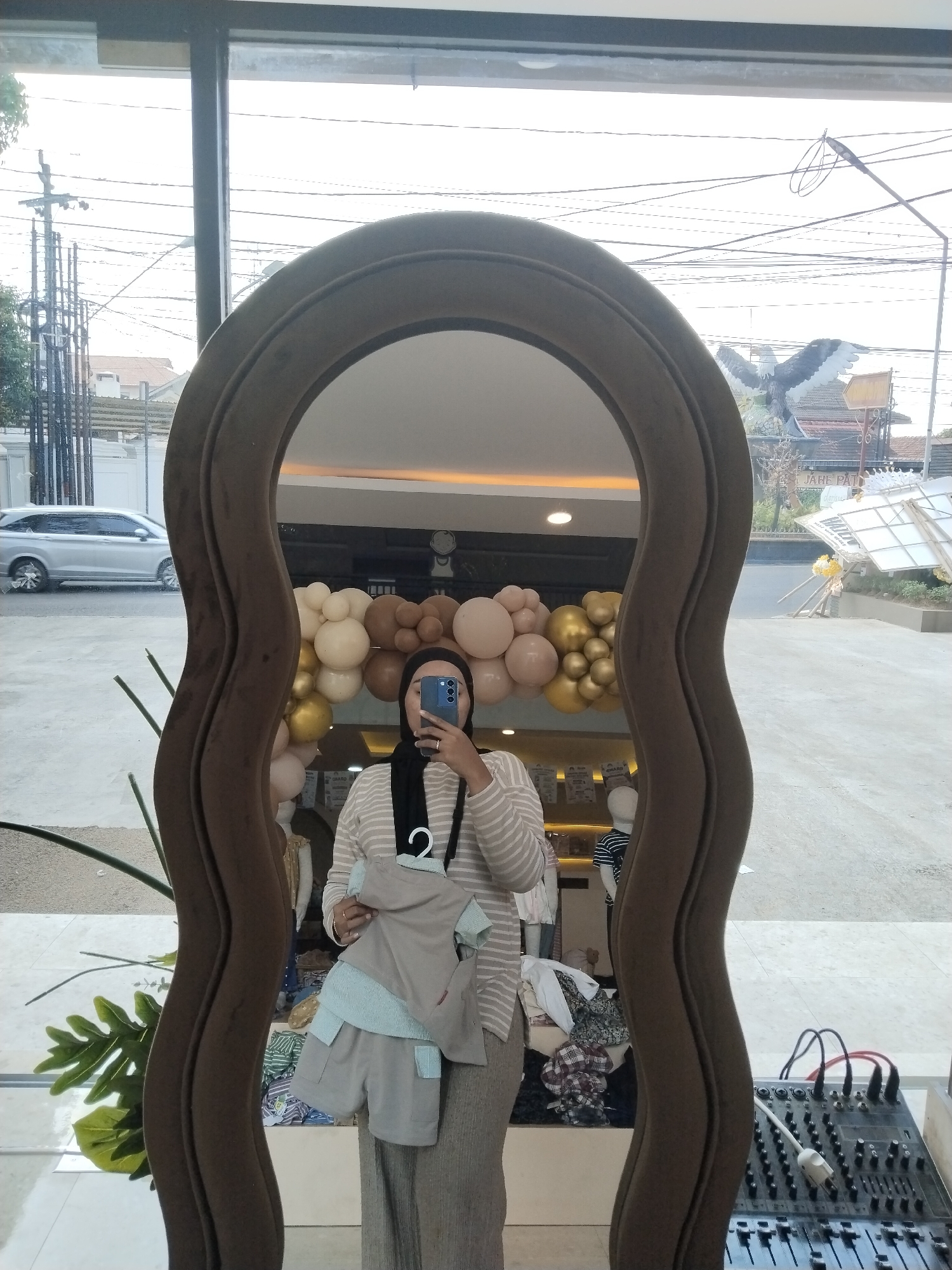 Children's clothing store visit with flowers and a baby gift