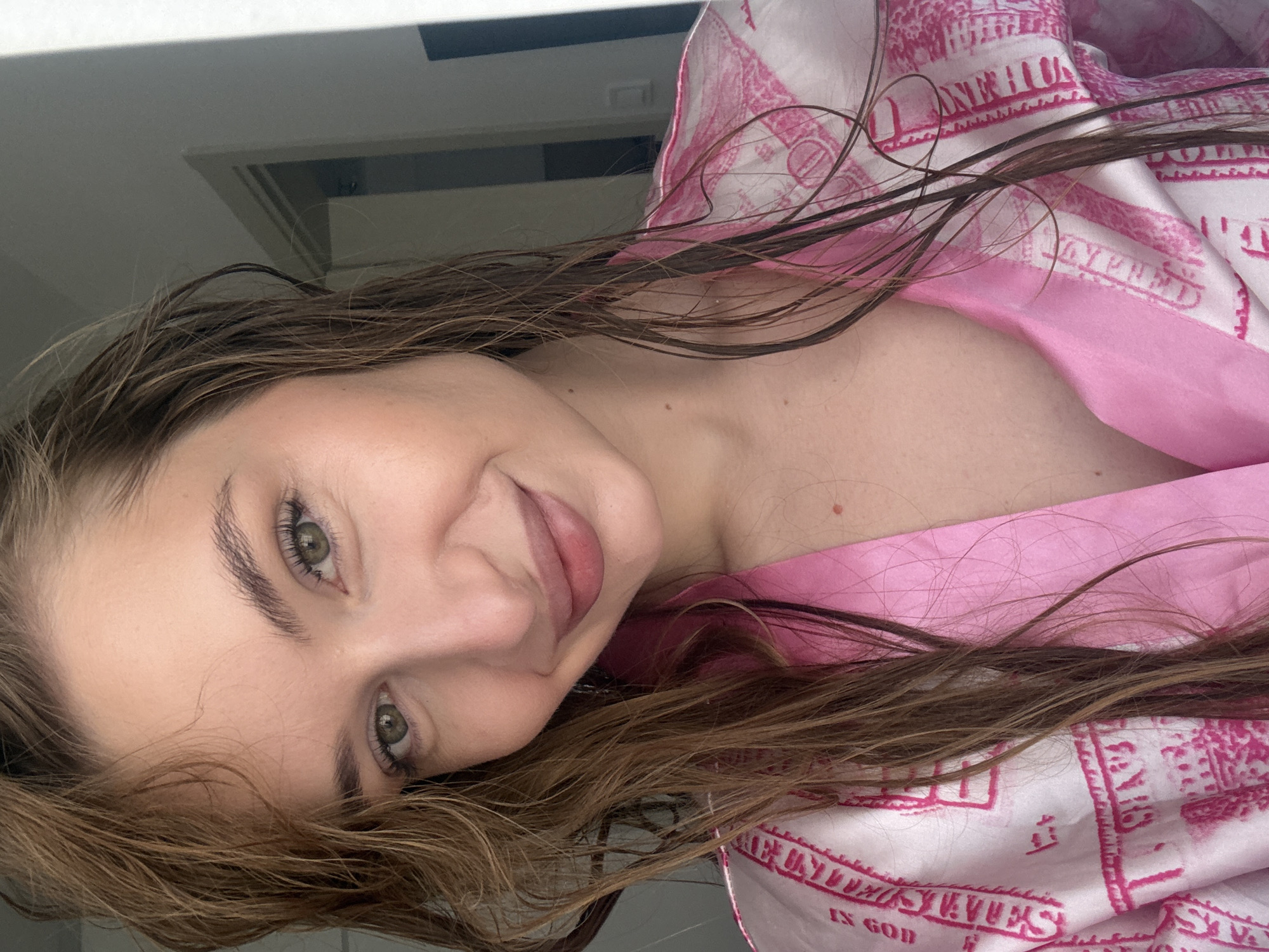 Woman in dollar-print robe photographed multiple times in Budva
