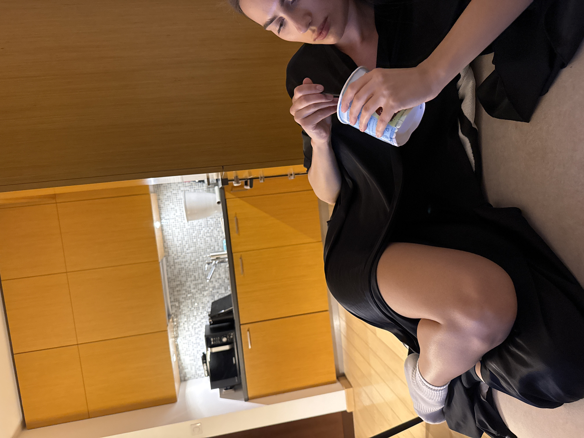 Woman's quiet evening at home in Warsaw apartment