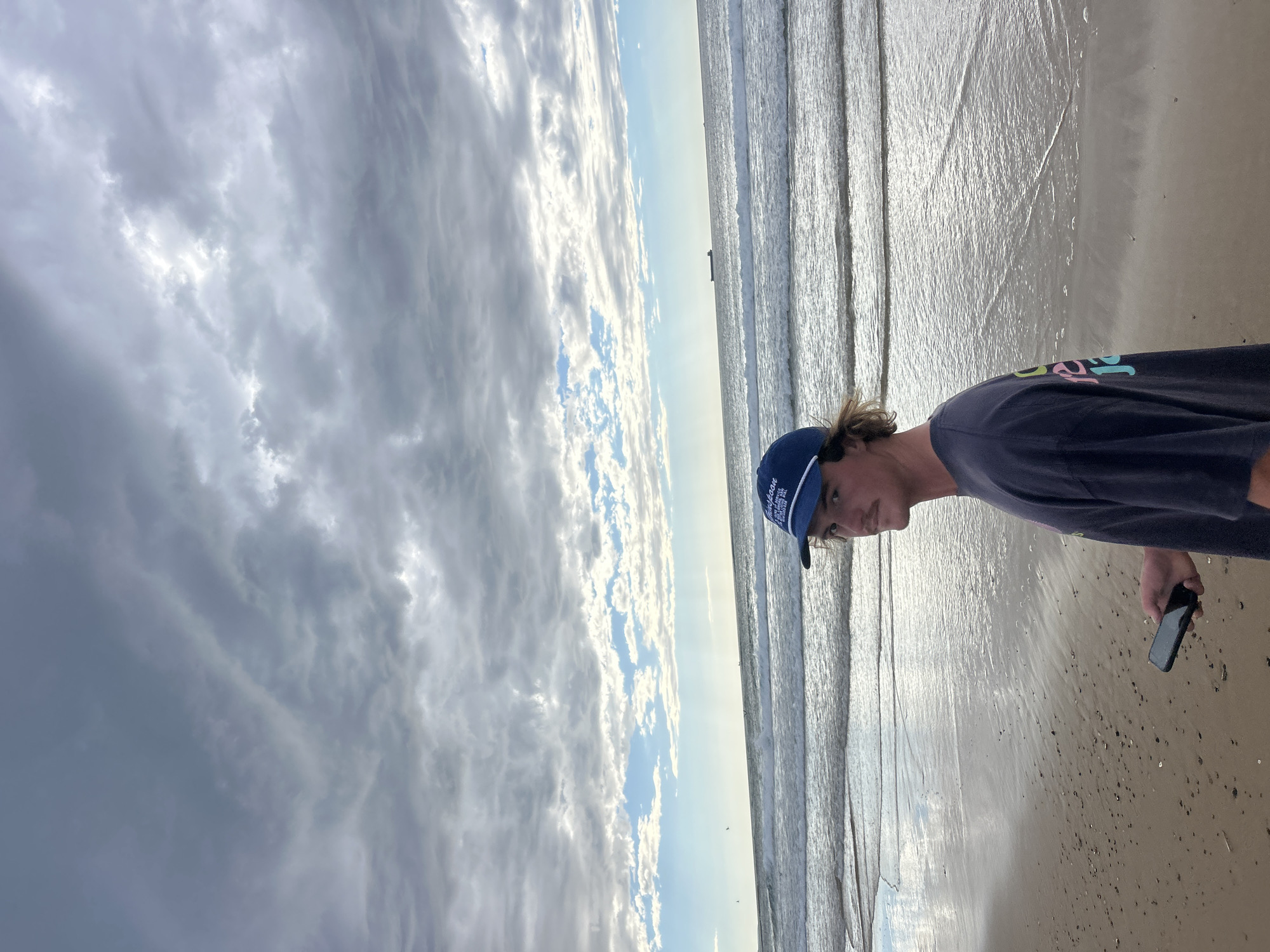 Evening beach gathering at Bulli Beach draws multiple visitors