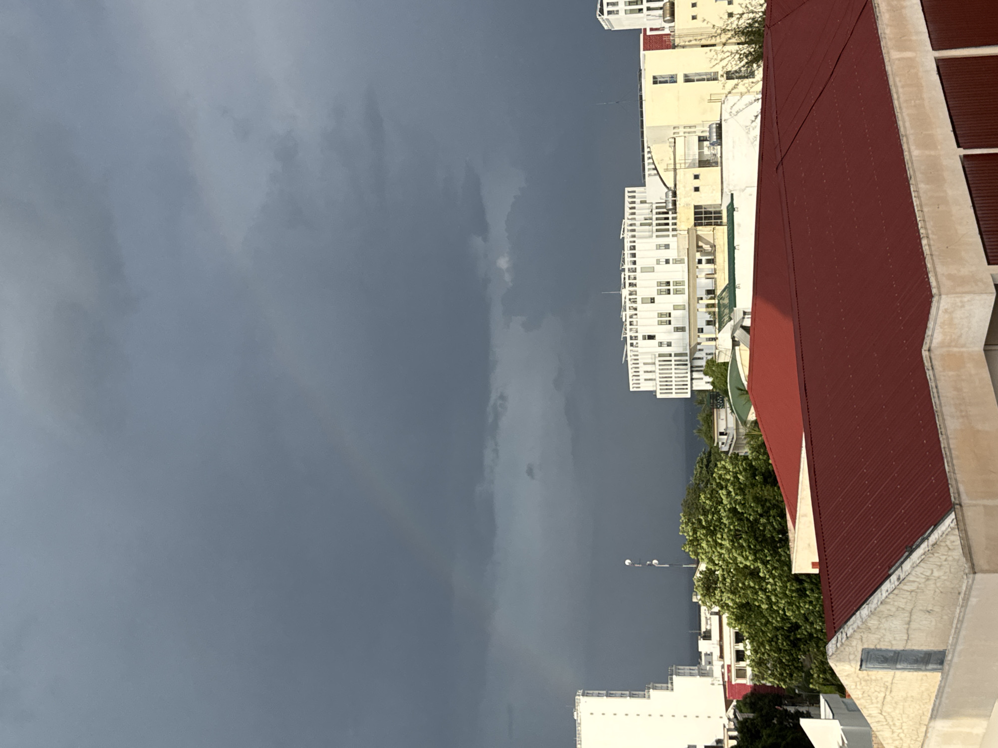 Faint rainbow over Nha Trang on a cloudy morning