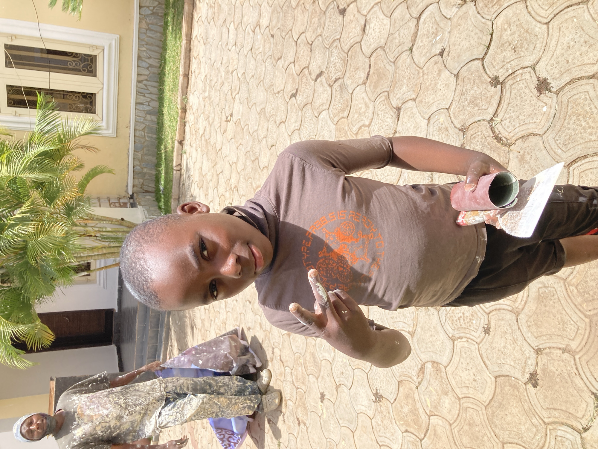 Building maintenance and painting activities documented in Jos, Nigeria