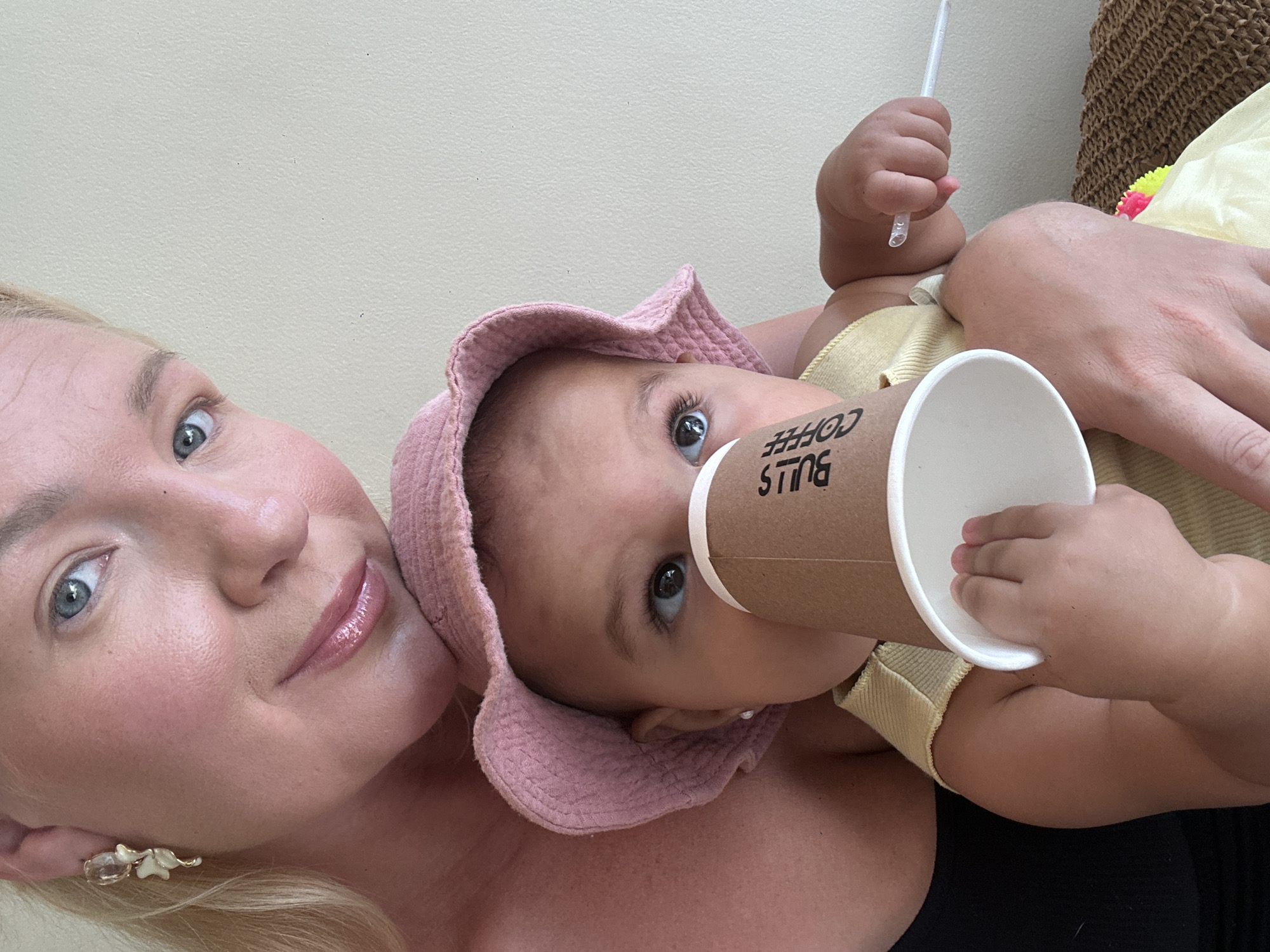 Mother and baby enjoy garden time in North Kuta