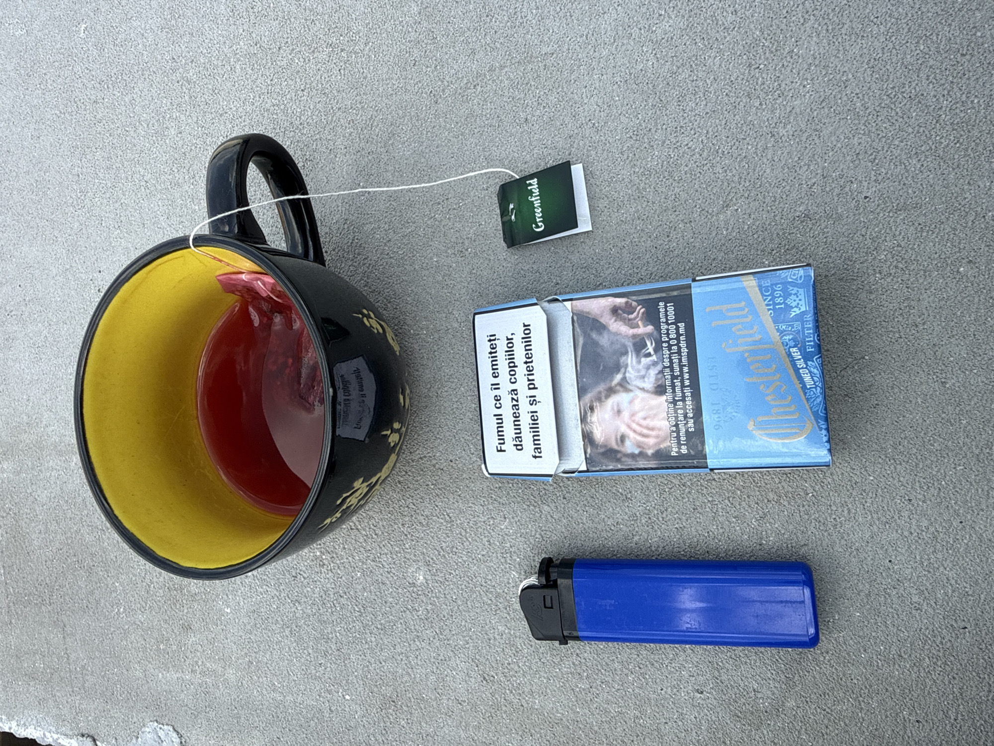 Tea, maps, a metal shelter, and an industrial skyline