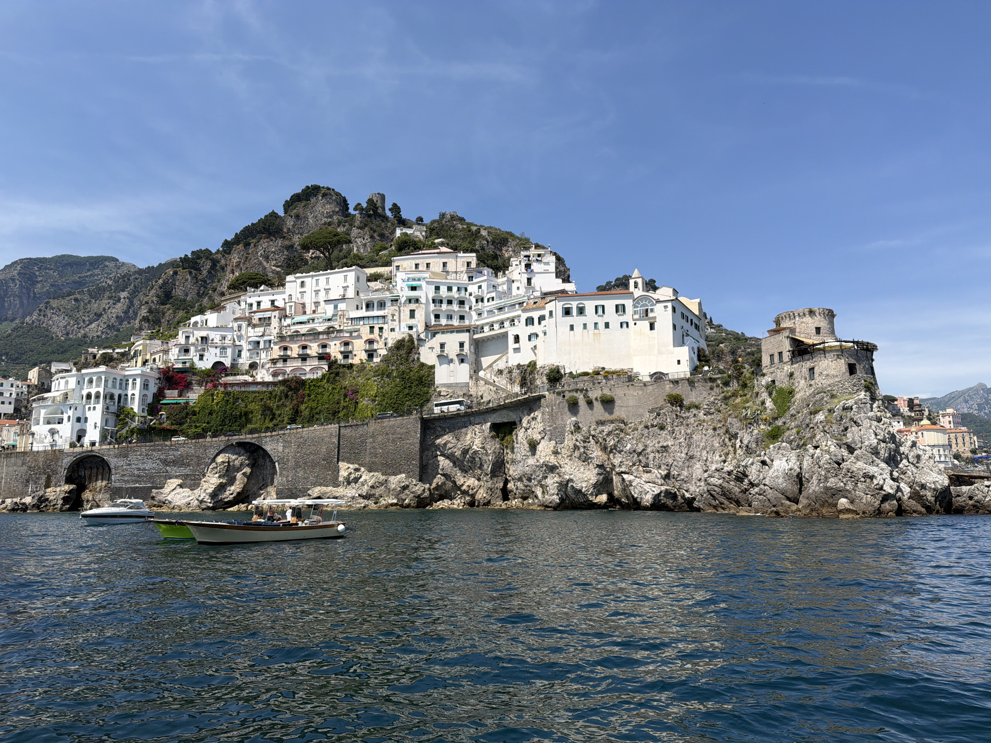 Coastal documentation of Pogerola, Italy shows architecture and maritime activity