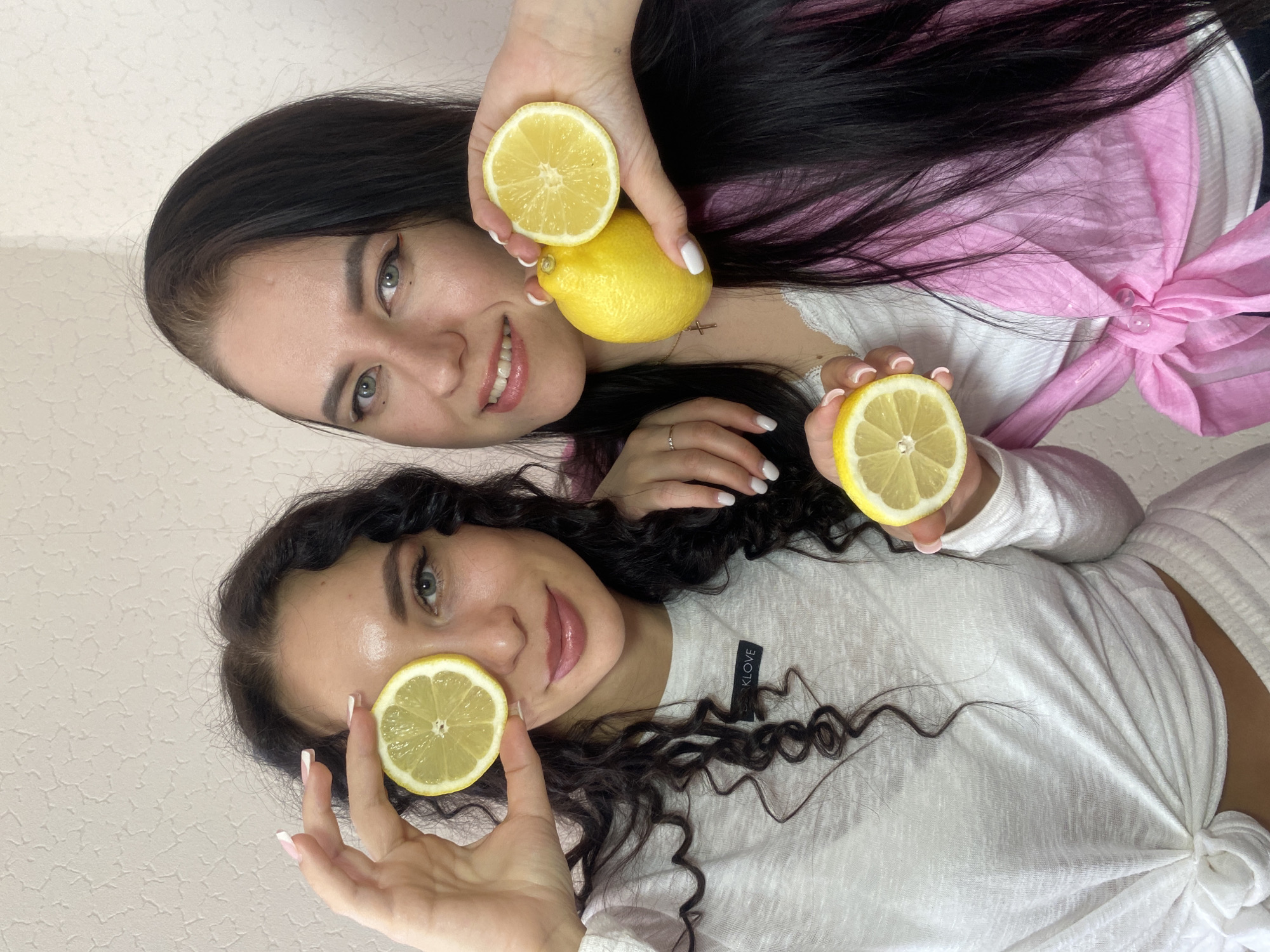 Young women stage playful lemon photoshoot in Chaikovsky, Russia