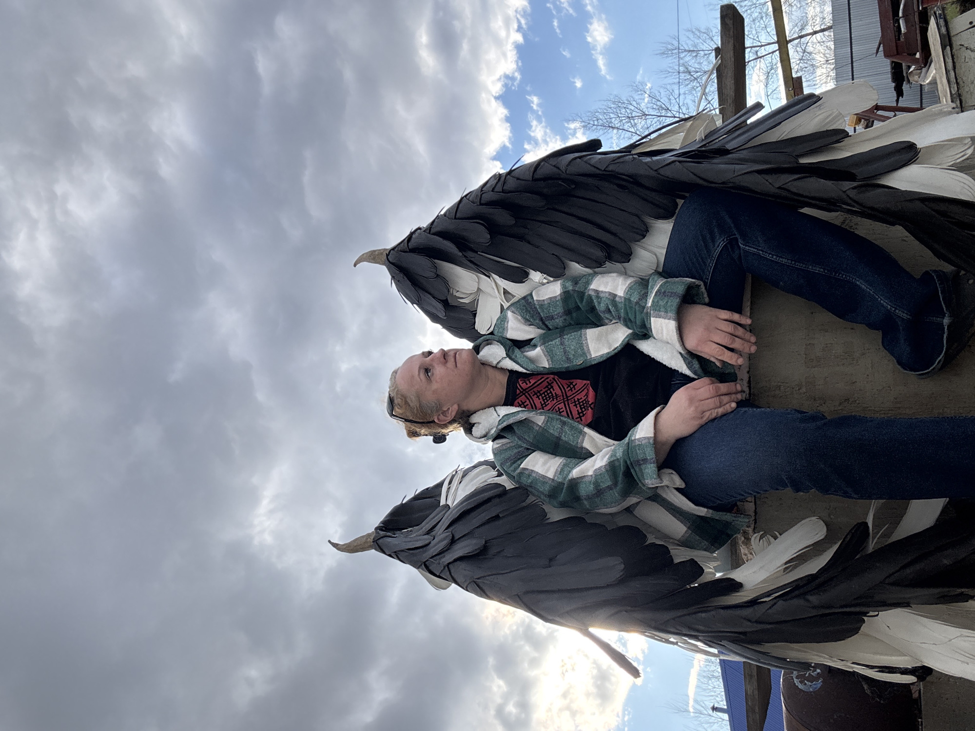 Woman poses with artificial wings in Chaikovsky, Russia