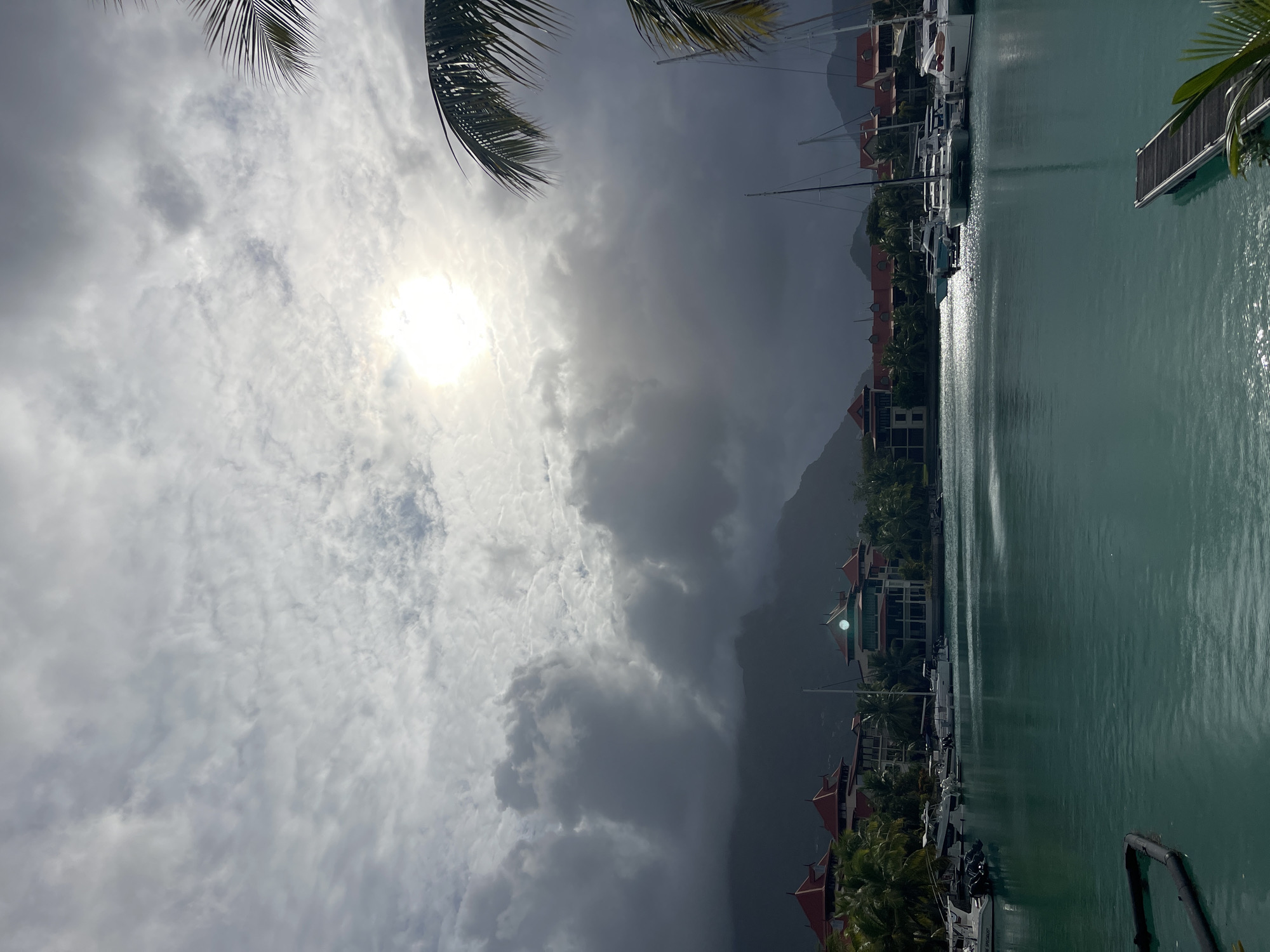 Turquoise marina under a glaring cloudy sky, Providence, Seychelles