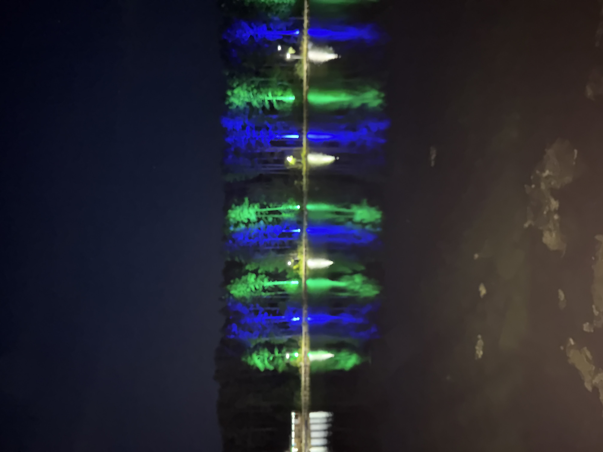Colorful nighttime lighting event at Lake Turgoyak