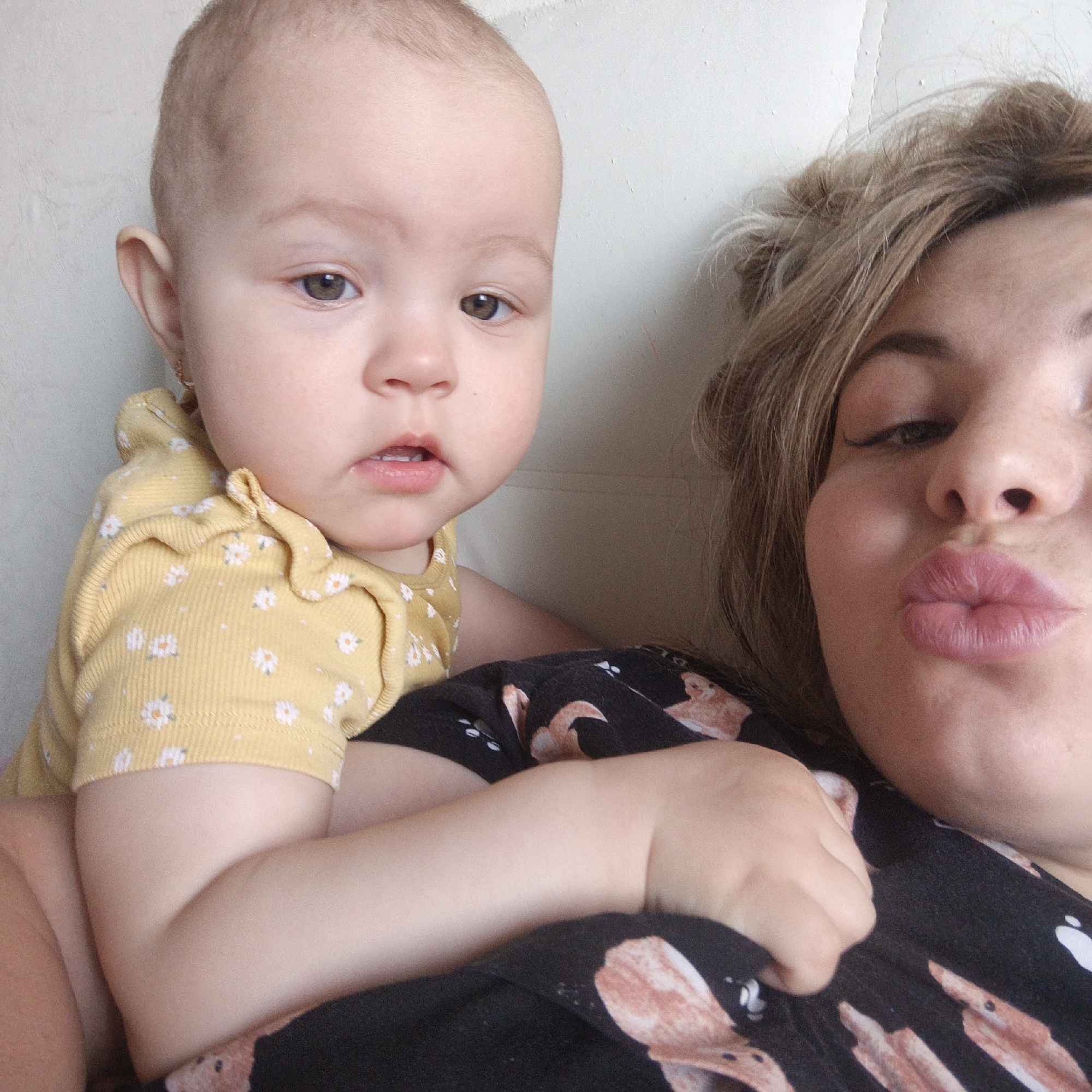 Personal moments captured: infant, selfie, identification tag with tattoo