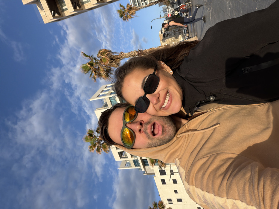 Visitors enjoy typical beach day activities on Tel Aviv promenade