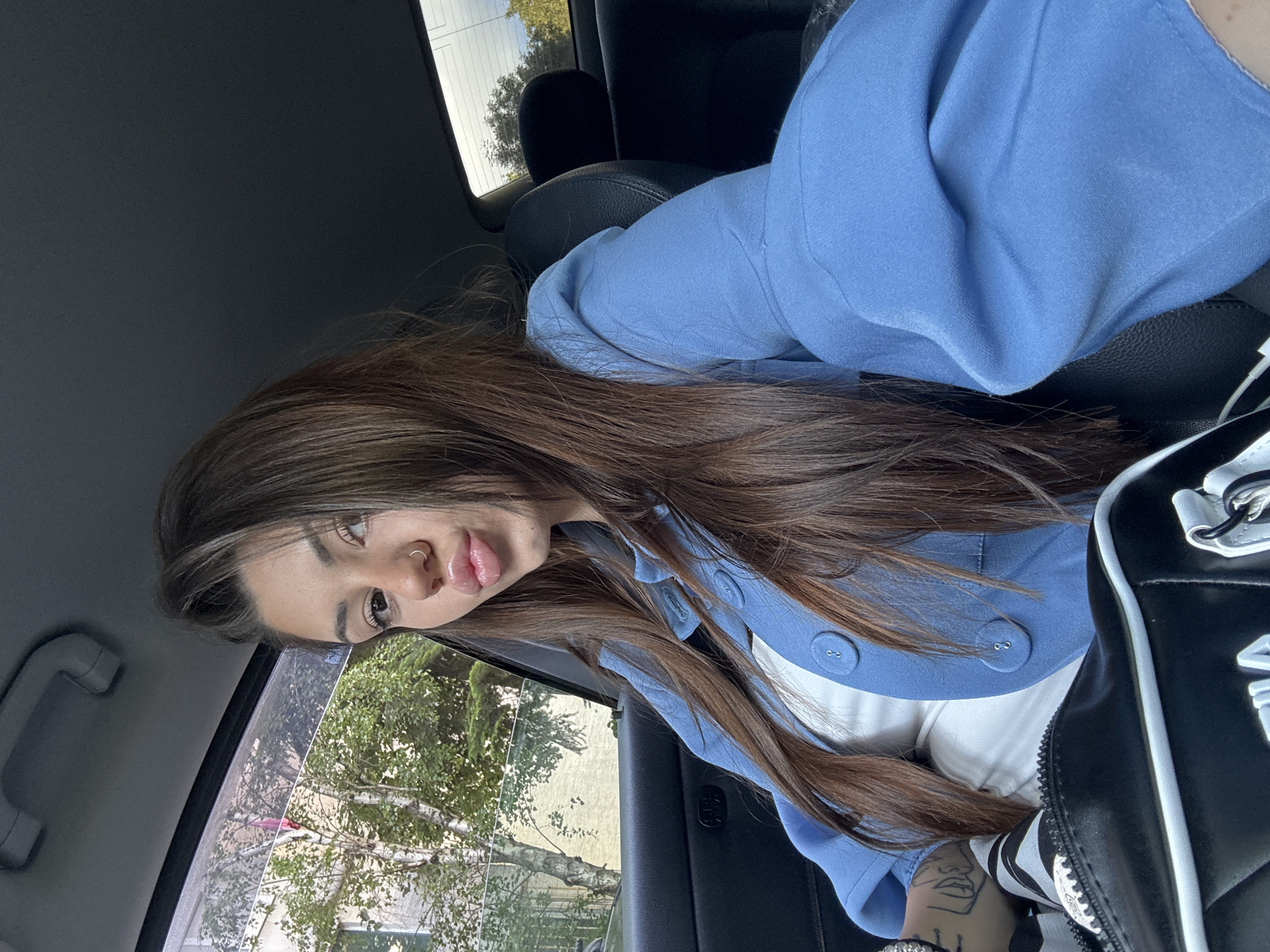 Woman photographed in car during morning hours in Sofia