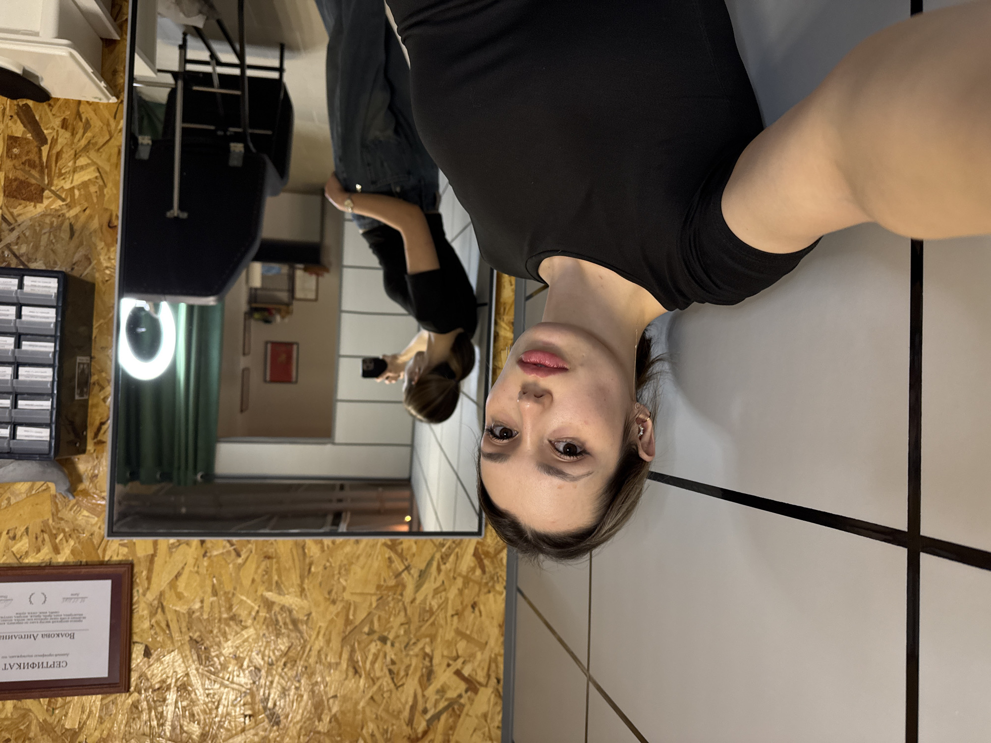 Tattoo session and mirror selfies captured at studio location