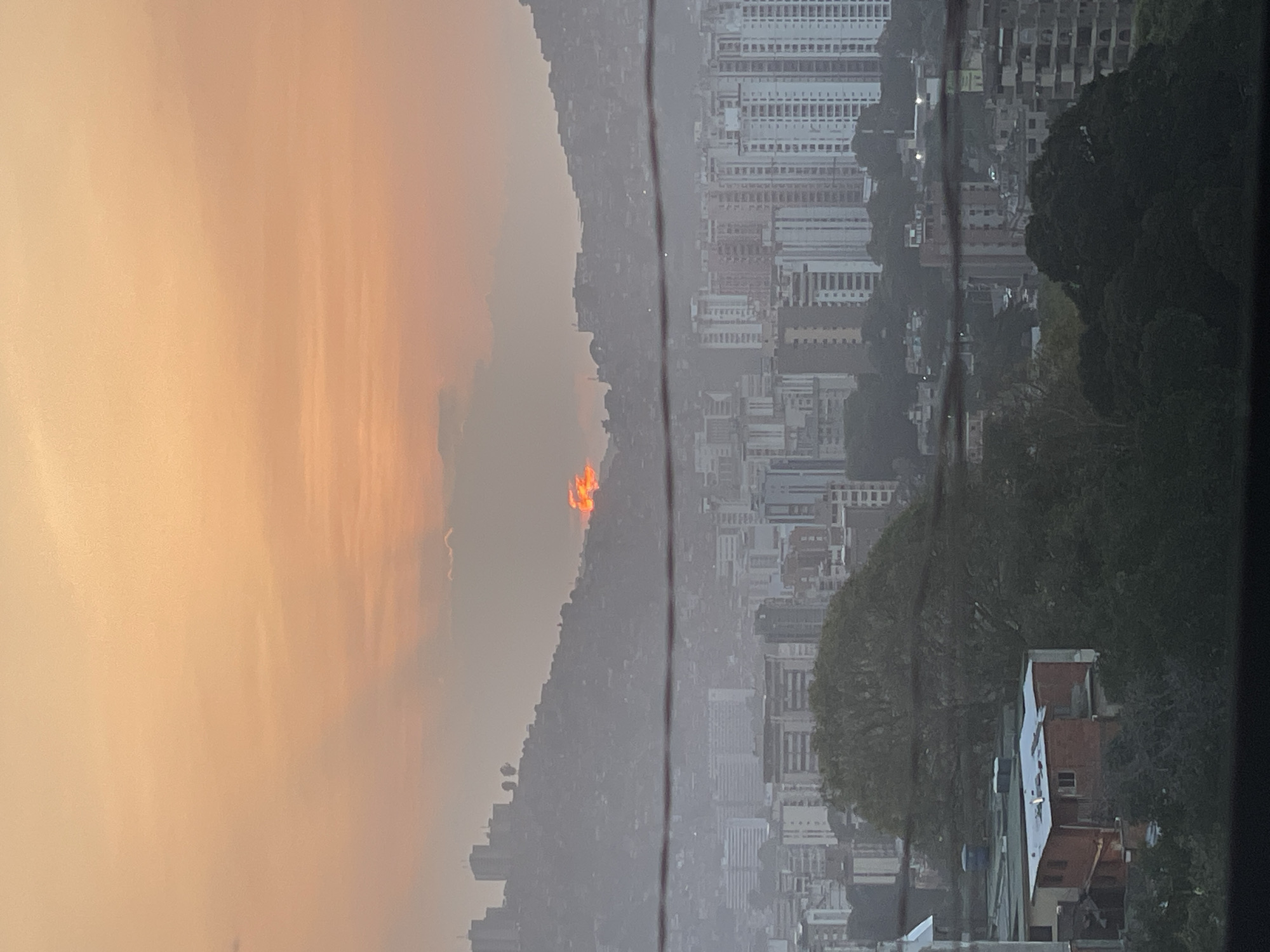 Elevated sunset views captured over Caracas cityscape