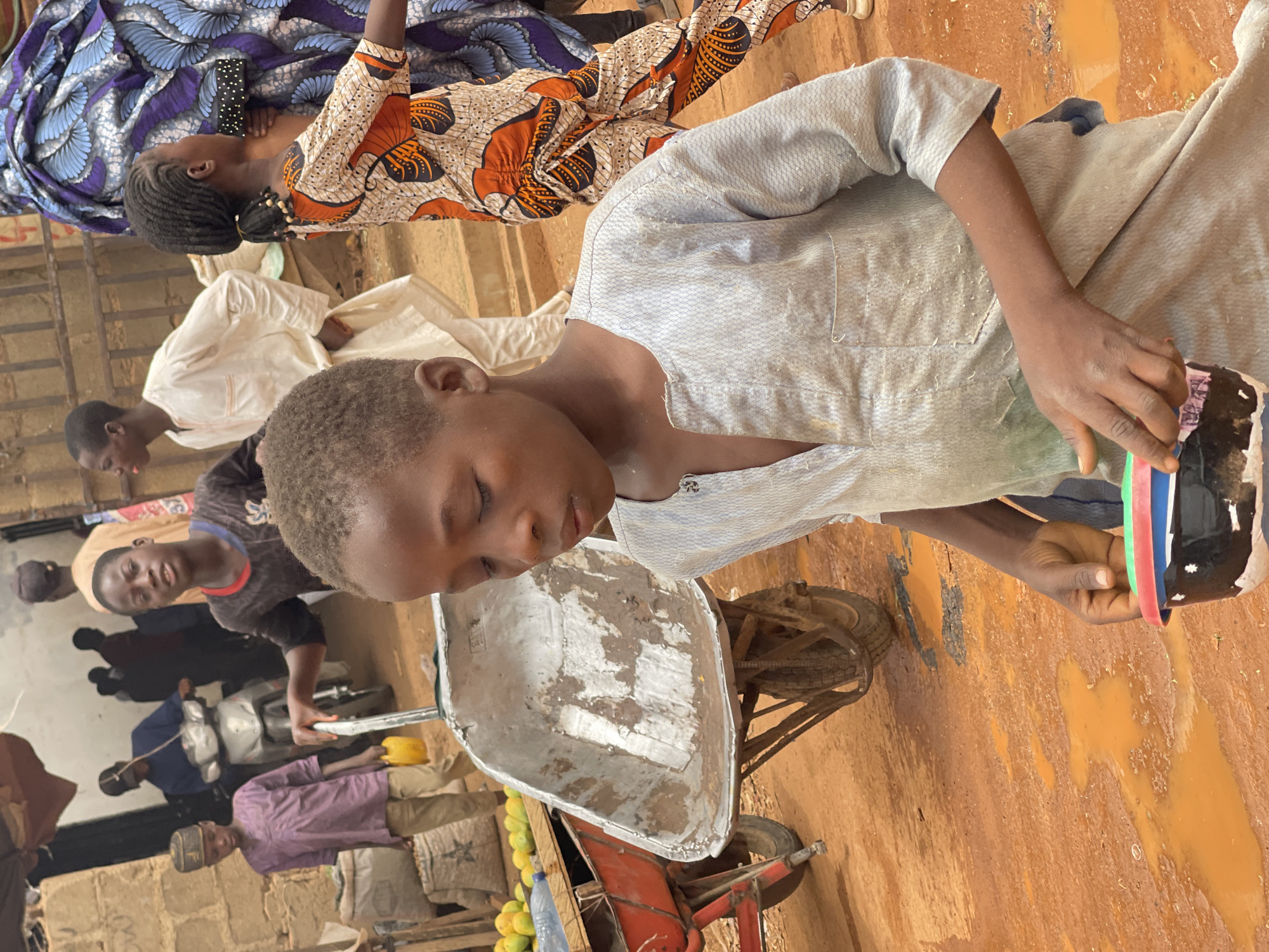 Daily life scenes captured across Zaria, Nigeria markets and streets