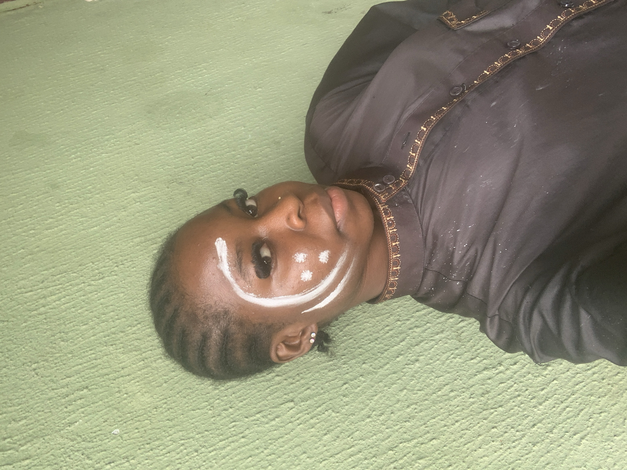 Styled portrait session with face paint, Ado, Nigeria