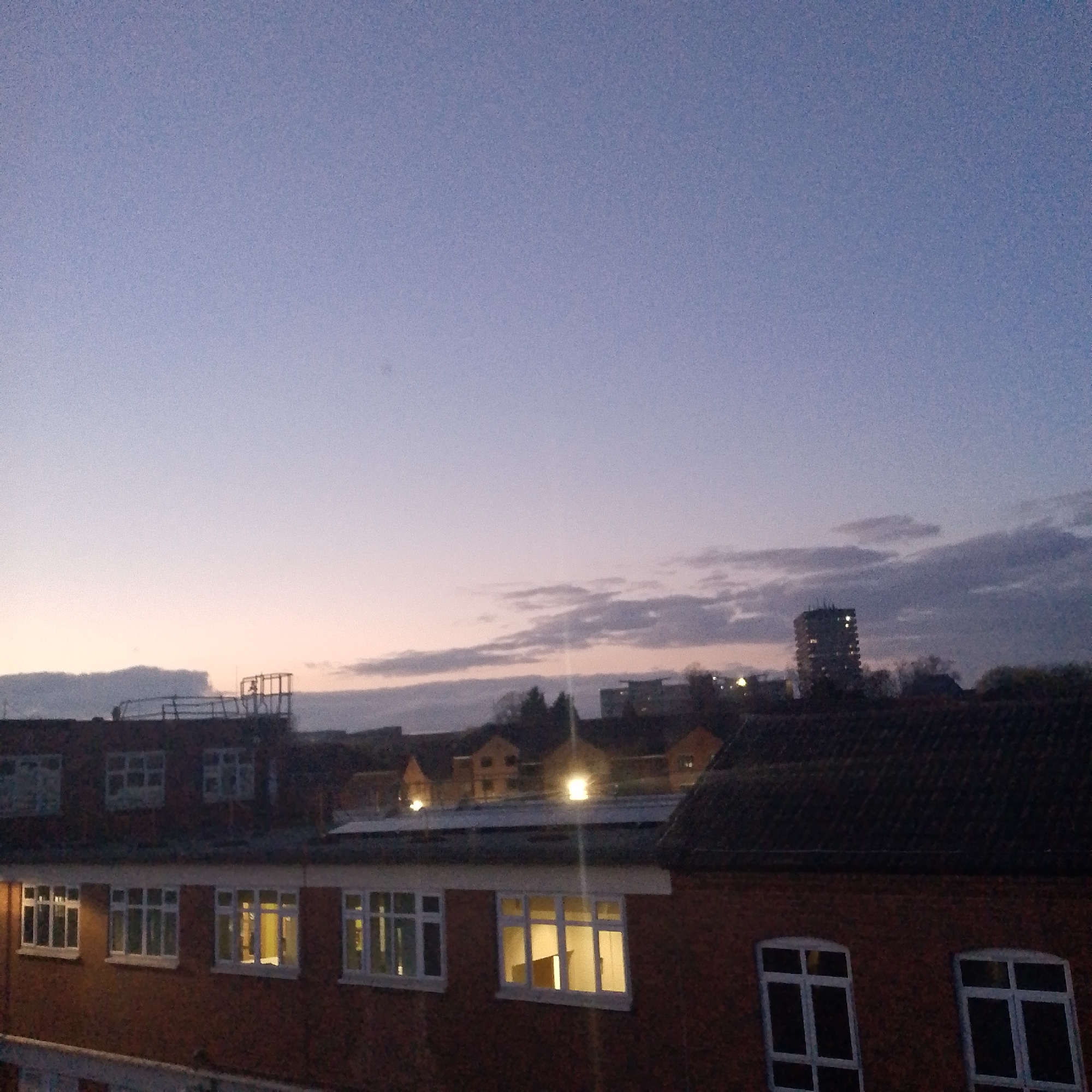 Twilight cityscape captured across Coventry's residential districts