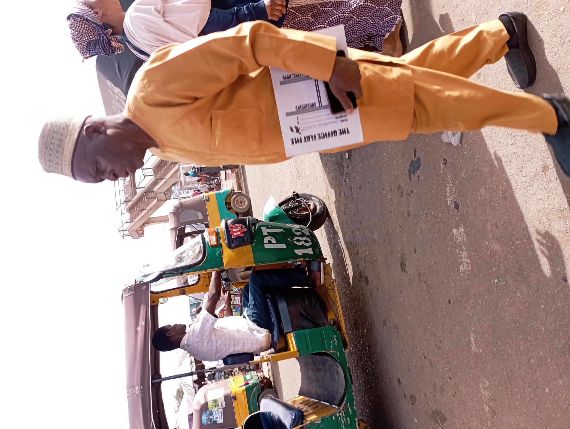 Morning street life documented in Jos, Nigeria auto-rickshaw area
