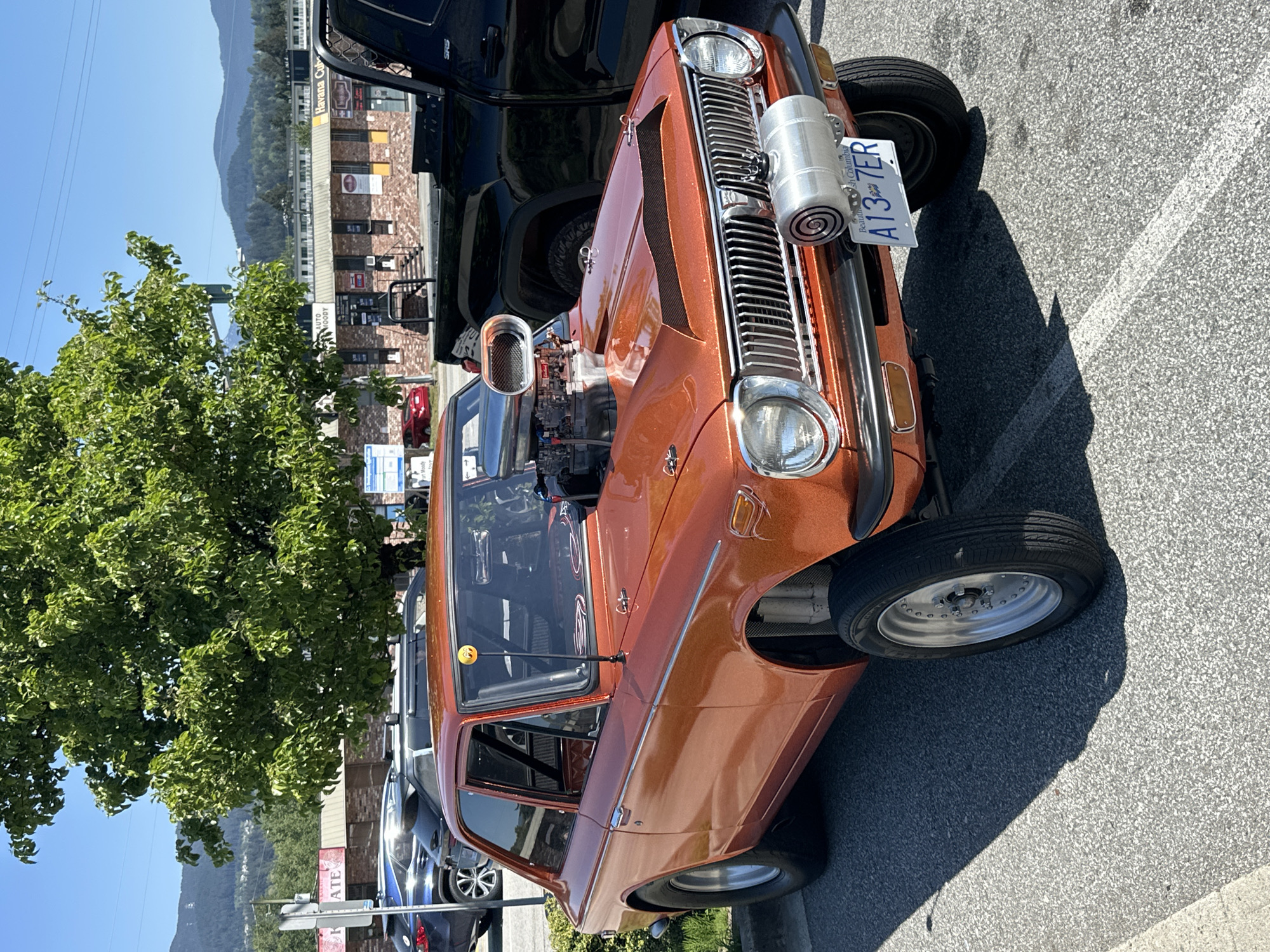 Custom orange Toyota Corolla spotted in Port Moody parking lot