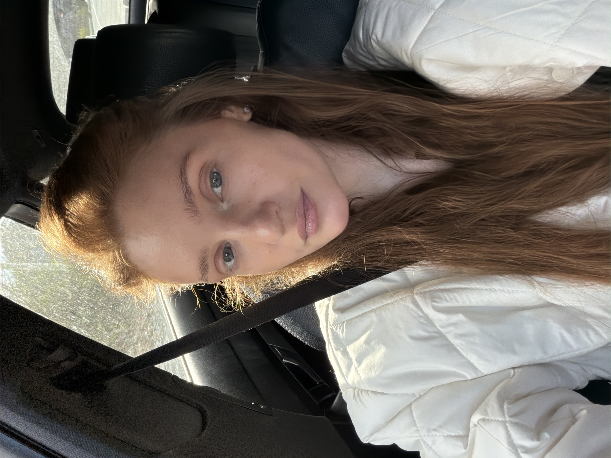 Woman in white jacket observed in vehicle, Montenegro