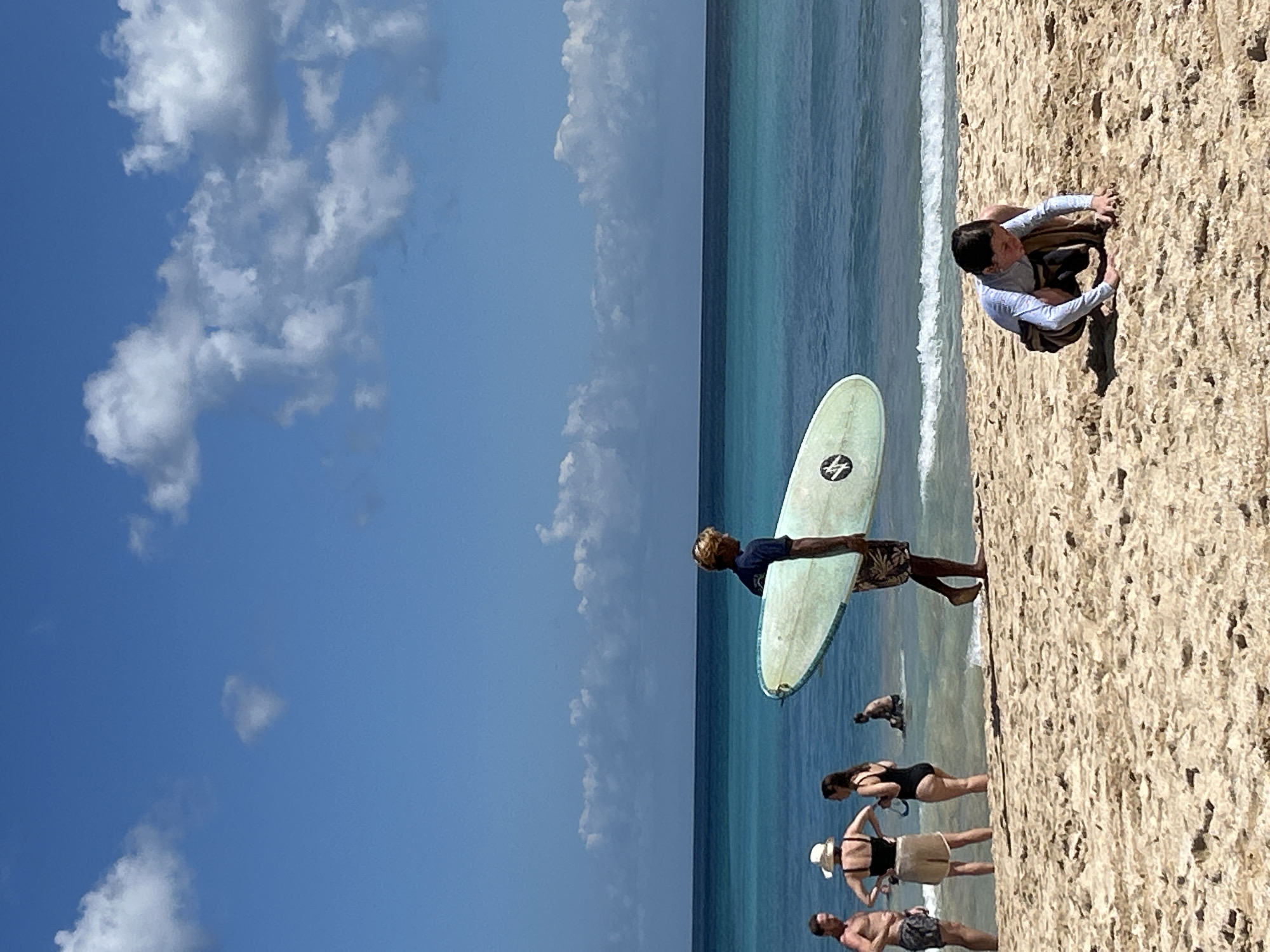 Busy afternoon on a Kuta Selatan beach — surf, sun, and crowds