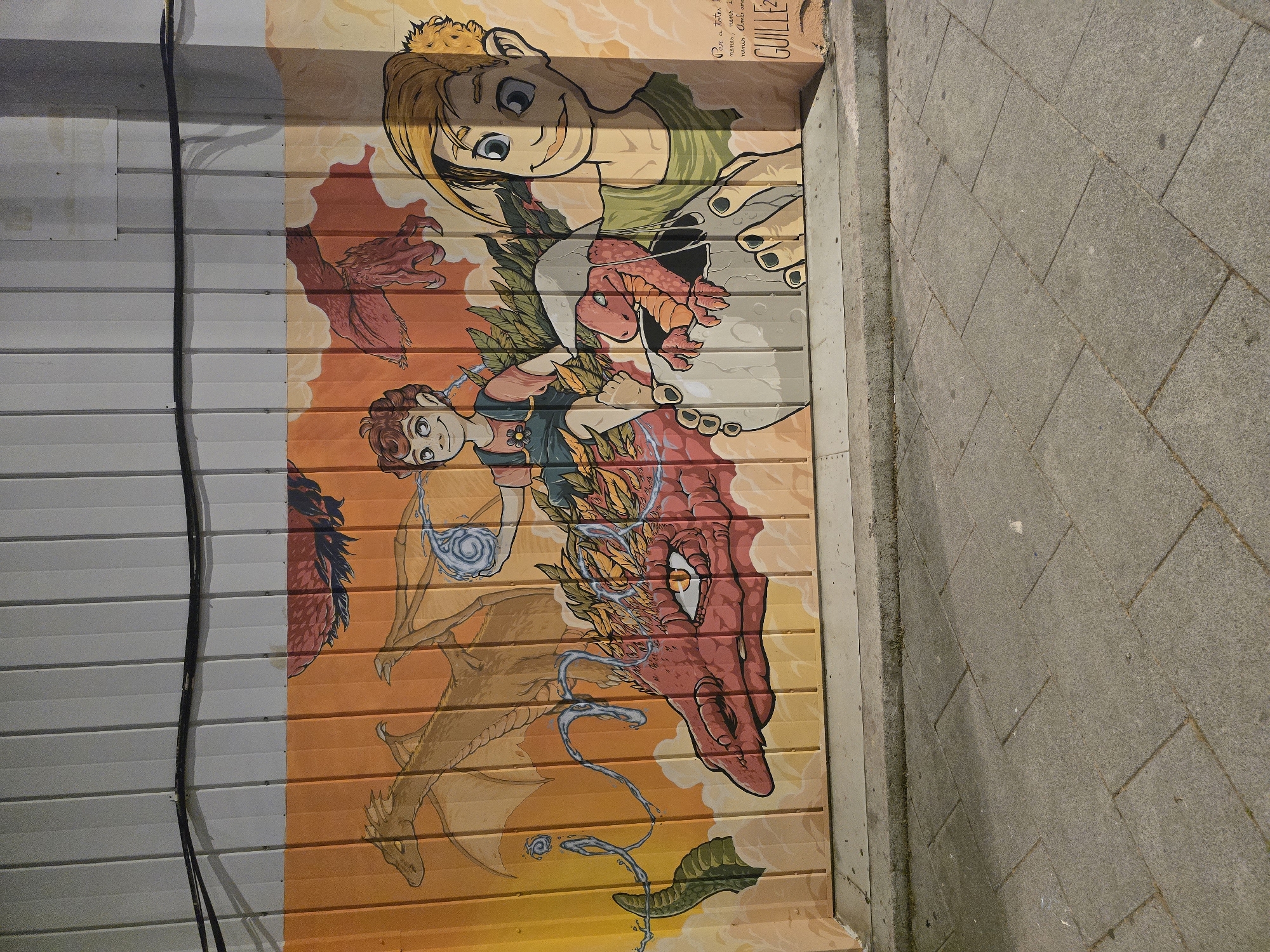 Street mural documented in Cornellà de Llobregat features diverse cartoon figures