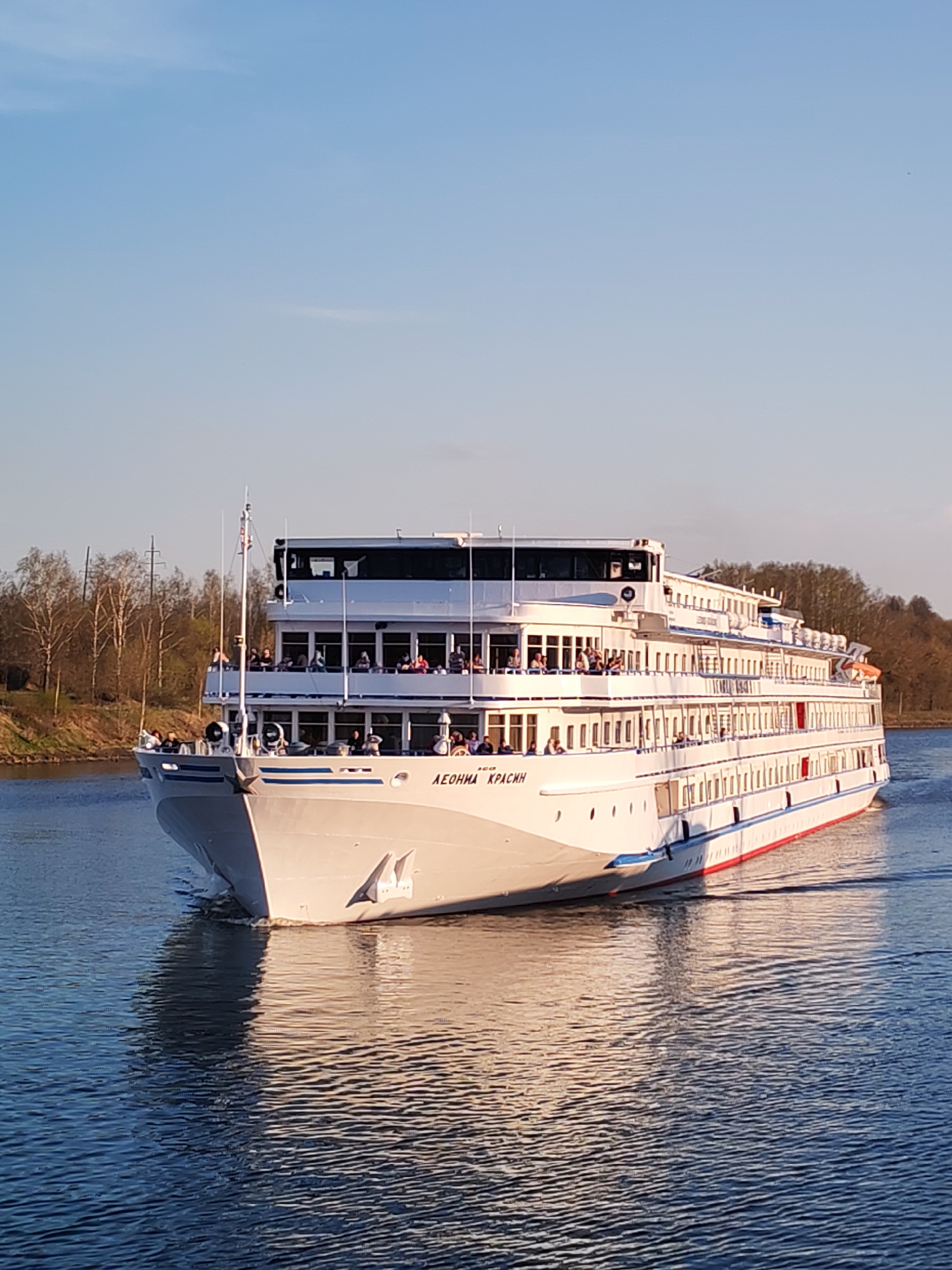 Cruise ship Леонид Красин sails through Базарово waterways
