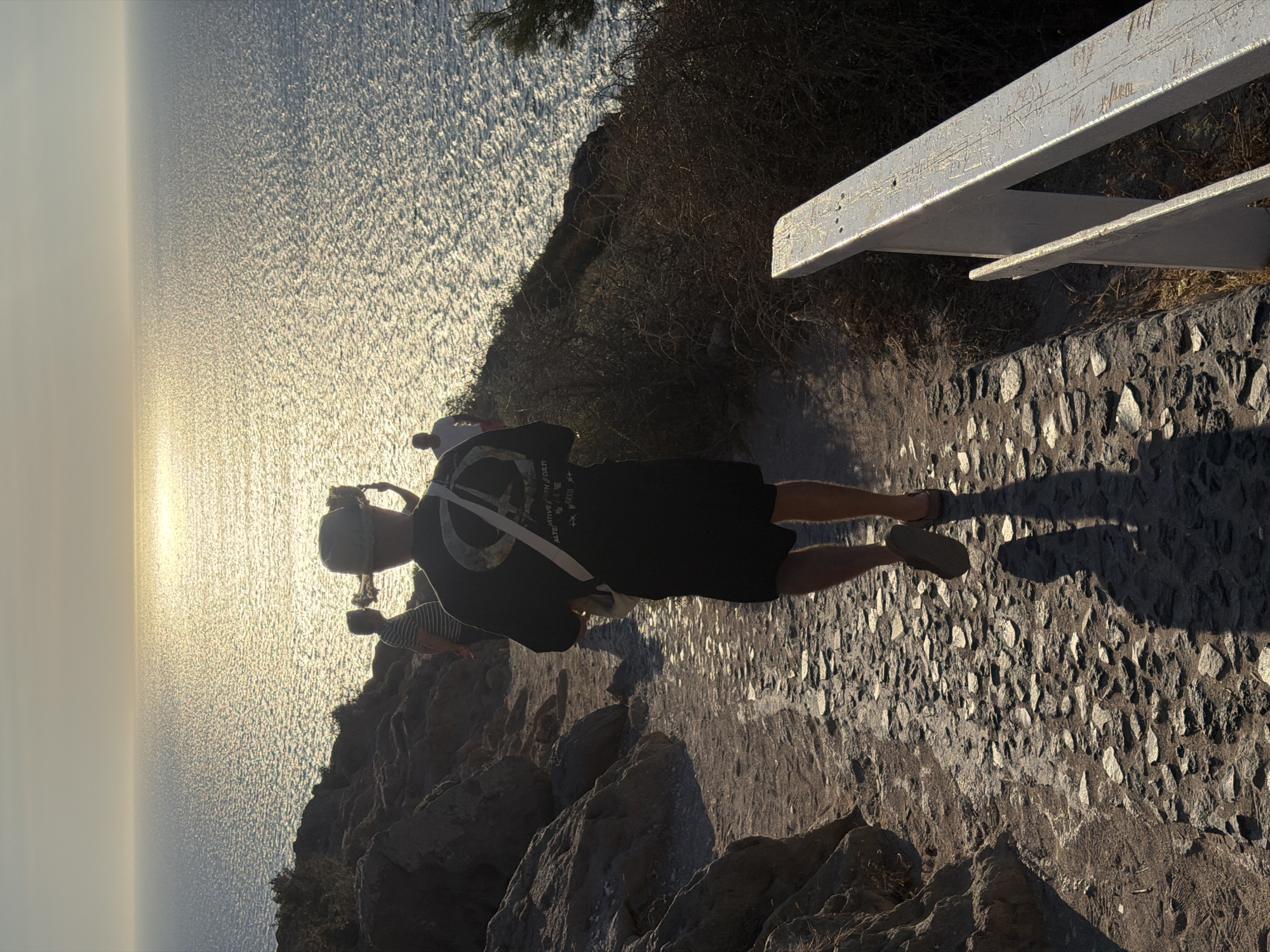 Clifftop lighthouse and coastal paths in Santorini